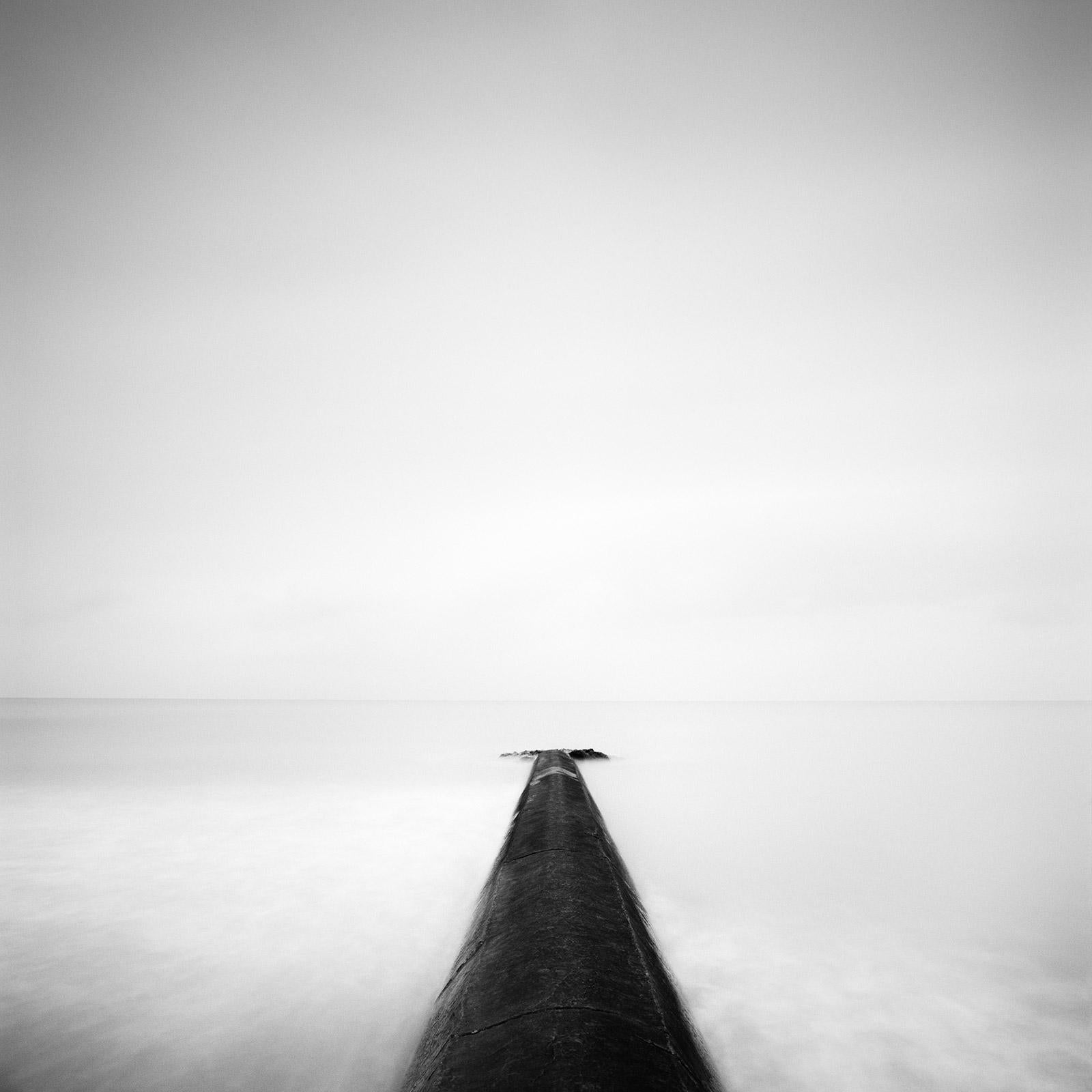 Gerald Berghammer Landscape Photograph - Straight on, Pier, Ozean, Normandie, France, black white photography, landscape