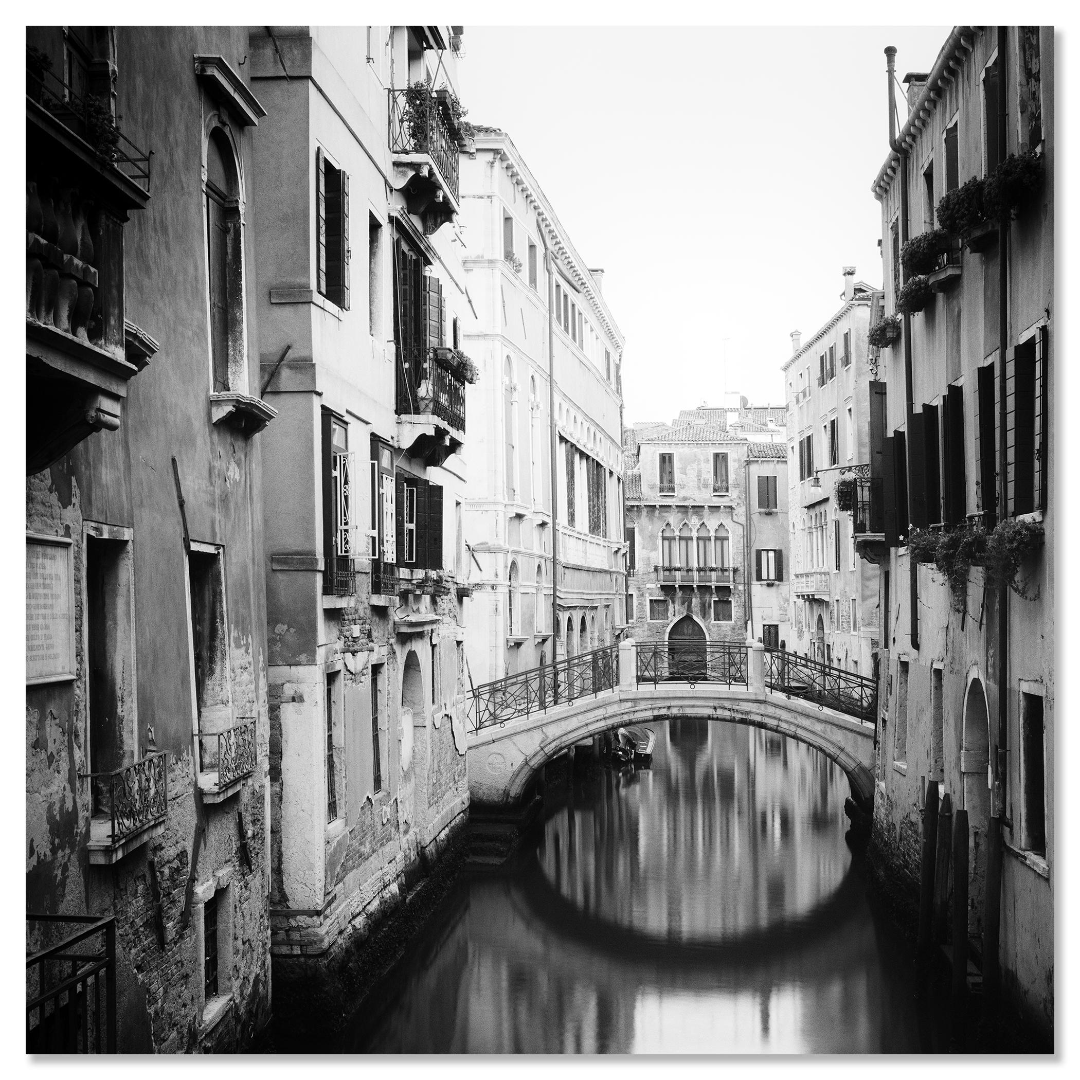The Bridges of Venice Study 2, Italy - no. 18213 - Black and White Fine Art landscape photography. 
Bridge on a quiet morning in a small canal in Venice, Italy. Archival pigment ink print, edition of 9. Signed, titled, dated and numbered by artist.