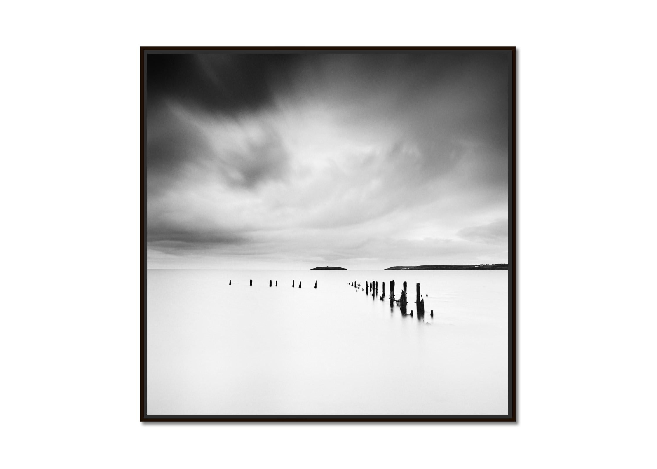 The Island, wavebreaker, stormy, Ireland, black and white landscape photography - Photograph by Gerald Berghammer