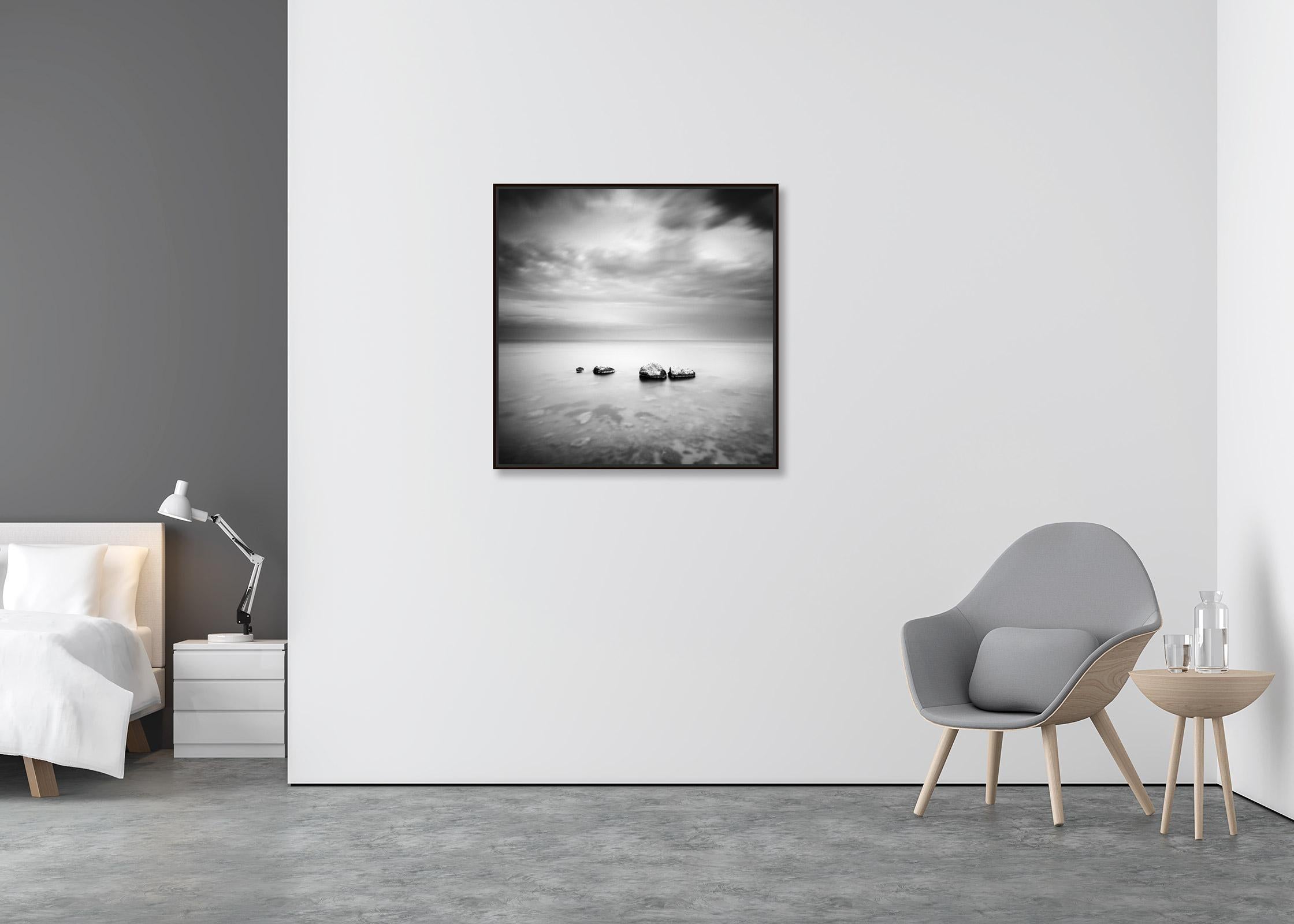 Three and a half Stone, black and white, long exposure, photography, seascape - Contemporary Photograph by Gerald Berghammer