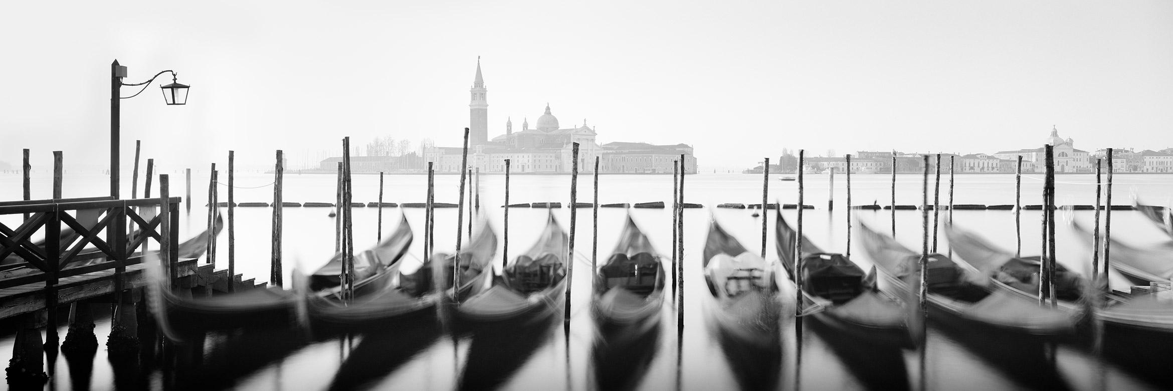 Gerald Berghammer Landscape Photograph - Twelve Gondolas, Venice, Italy, black and white fine art cityscape photography