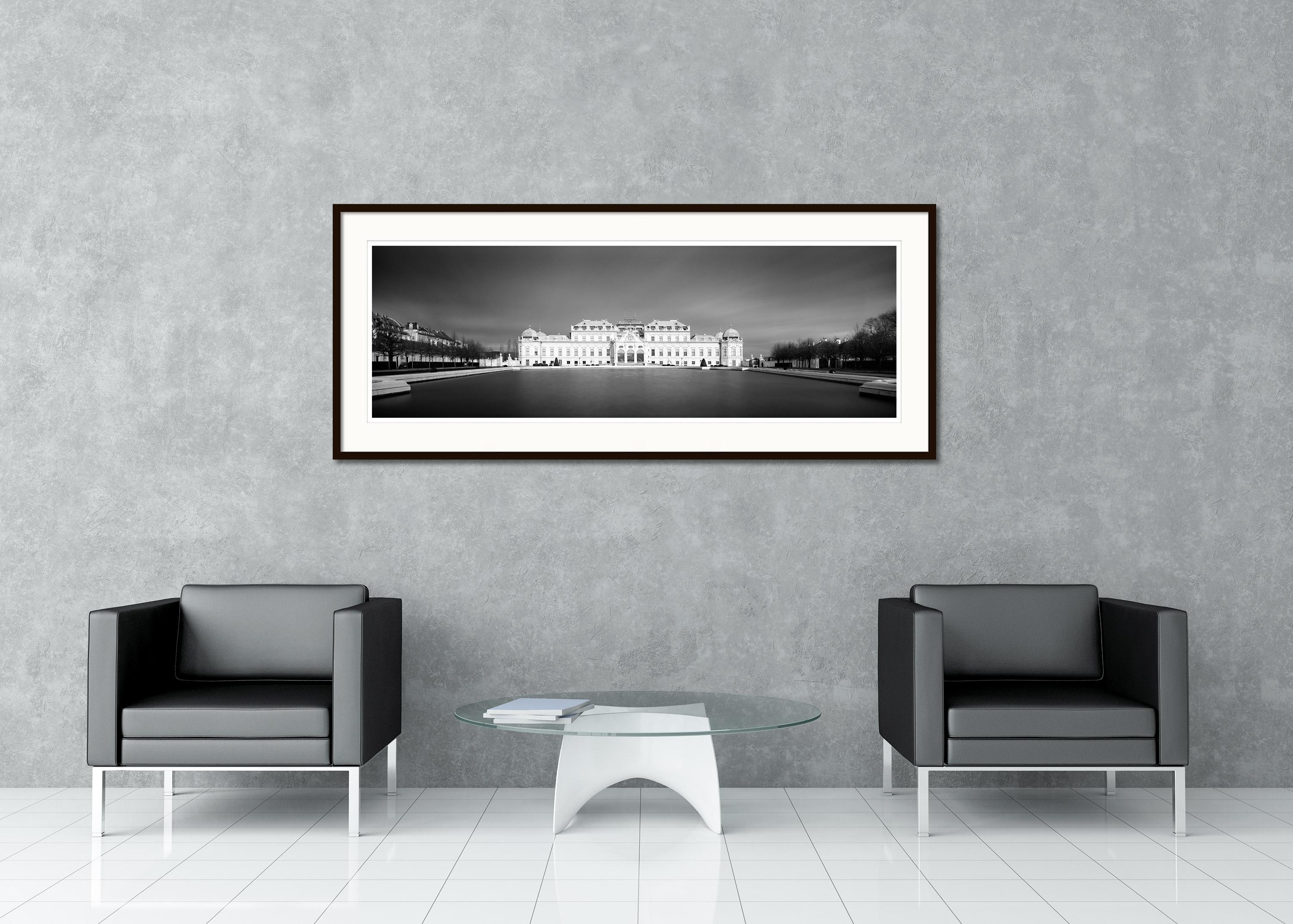 Black and White Fine Art panorama landscape - cityscape photography. Belvedere palace with water fountain during a storm with dark skies, Vienna, Austria. Archival pigment ink print, edition of 9. Signed, titled, dated and numbered by artist.