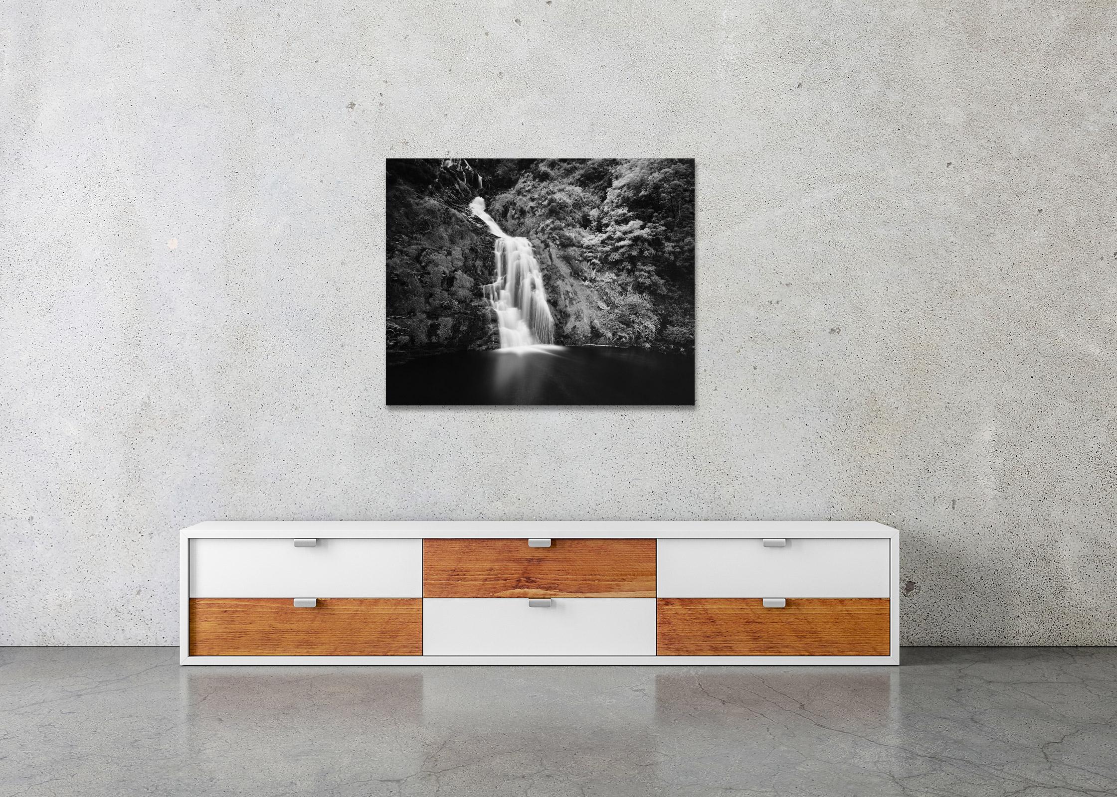 Black and white fine art long exposure landscape photography. Waterfall in the middle of the forest, Ireland. Archival pigment ink print, edition of 7. Signed, titled, dated and numbered by artist. Certificate of authenticity included. Printed with