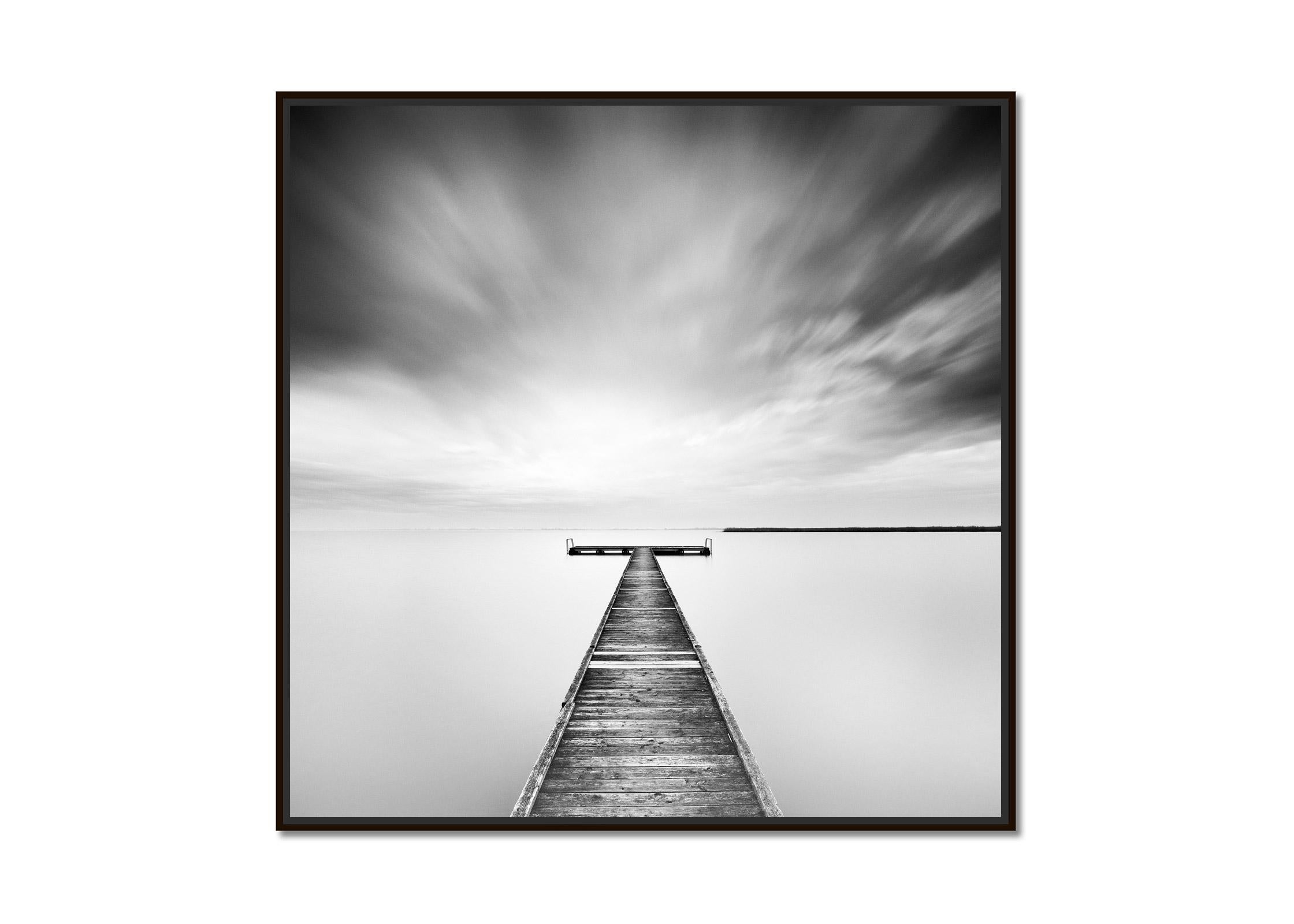 Winter Storm, lake, minimalist wood pier, black white art waterscape photography - Photograph by Gerald Berghammer