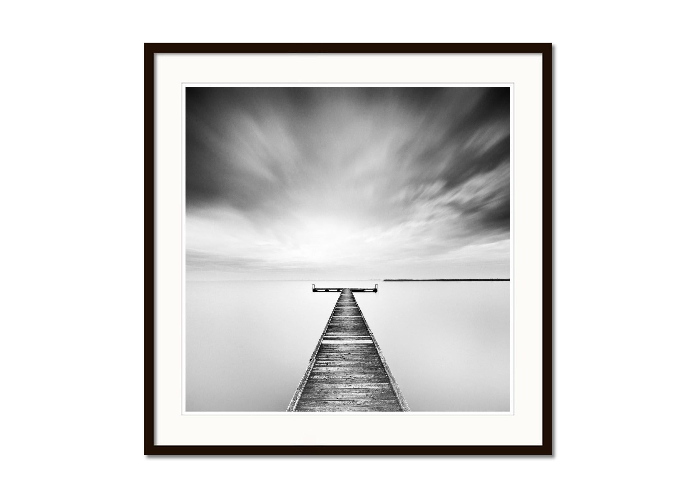 Winter Storm, lake, minimalist wood pier, black white art waterscape photography - Gray Black and White Photograph by Gerald Berghammer