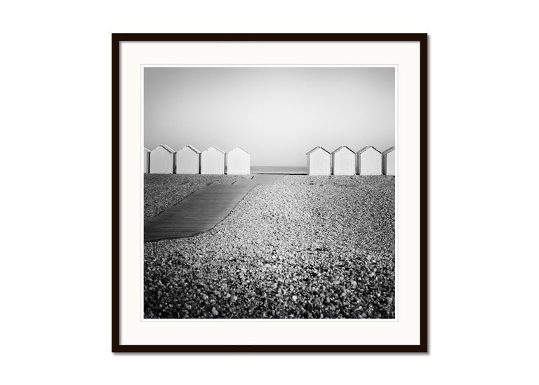 Image showcasing Gerald Berghammer - Wood Huts, Promenade, Rocky Beach, France, black ...