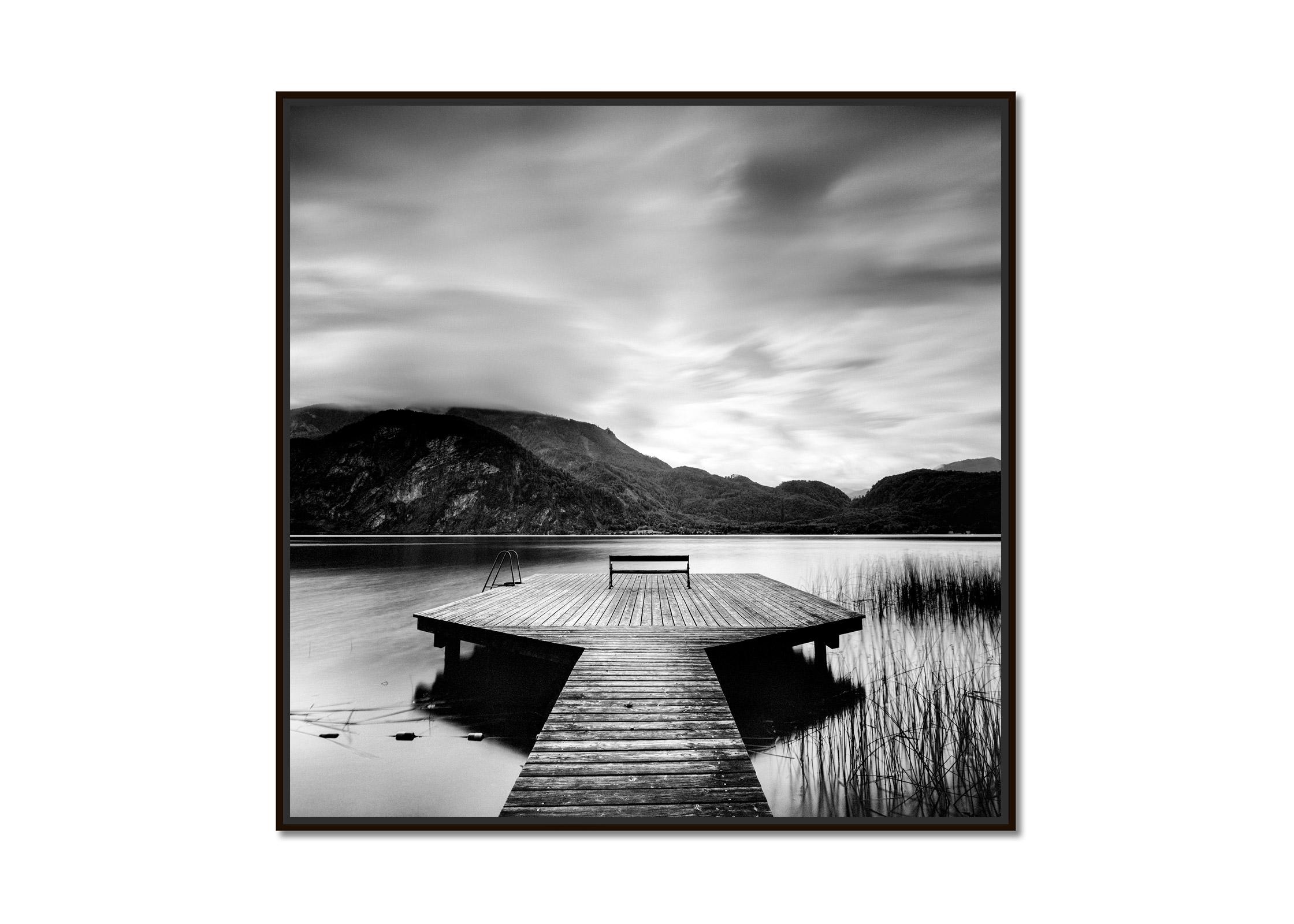 Wood Pier, lake, cloudy, storm, black and white photography, fine art waterscape - Photograph by Gerald Berghammer