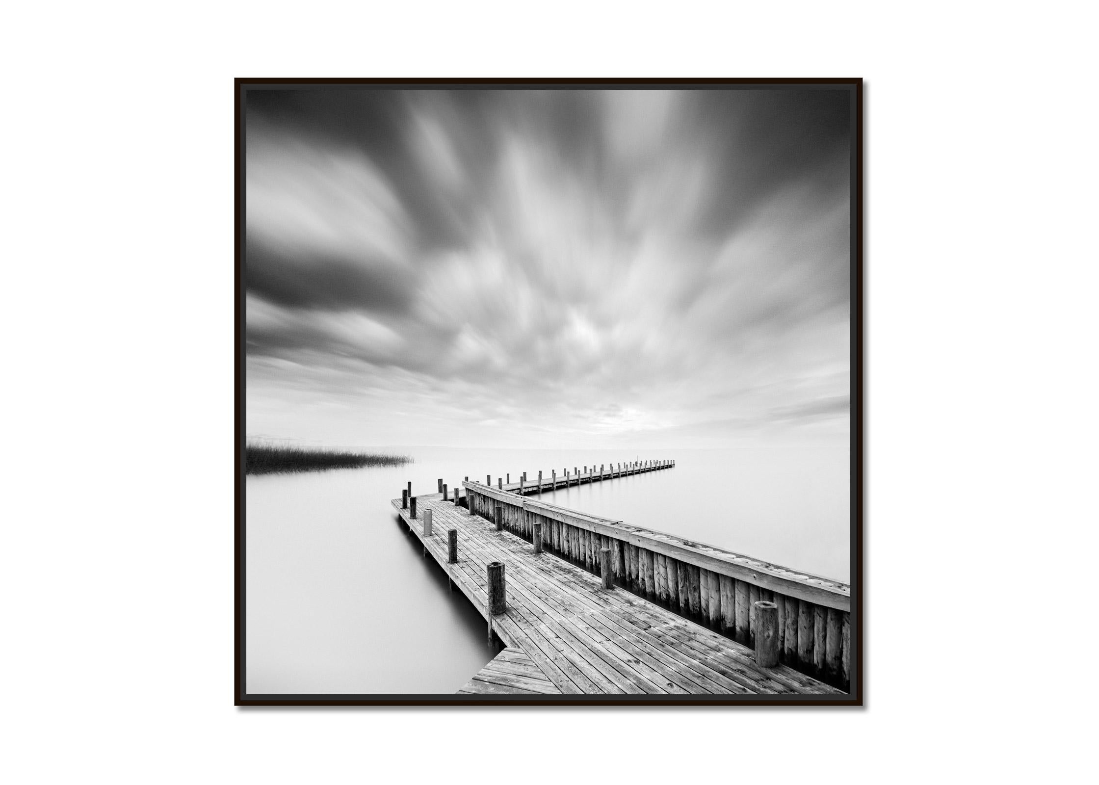 Wood Pier, lake, storm, black & white long exposure art waterscape photography - Photograph by Gerald Berghammer