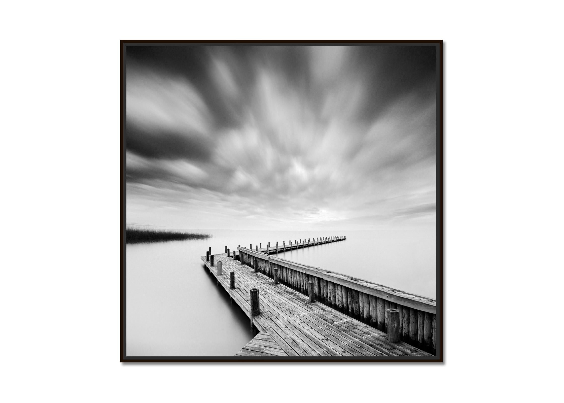 Wood Pier, lake, storm, long exposure black white fine art photography landscape - Photograph by Gerald Berghammer