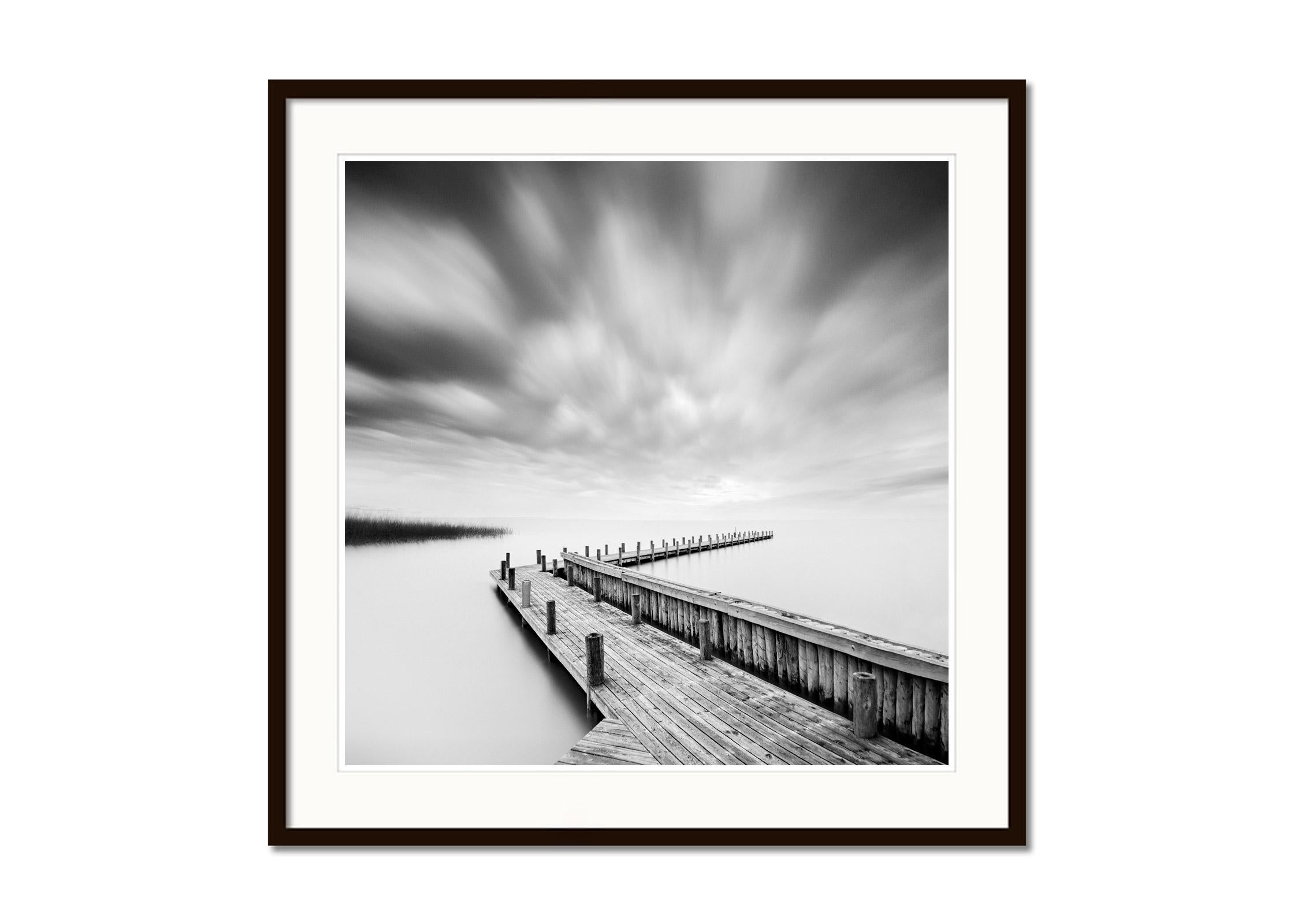 Wood Pier, lake, storm, black & white long exposure art waterscape photography - Gray Landscape Photograph by Gerald Berghammer