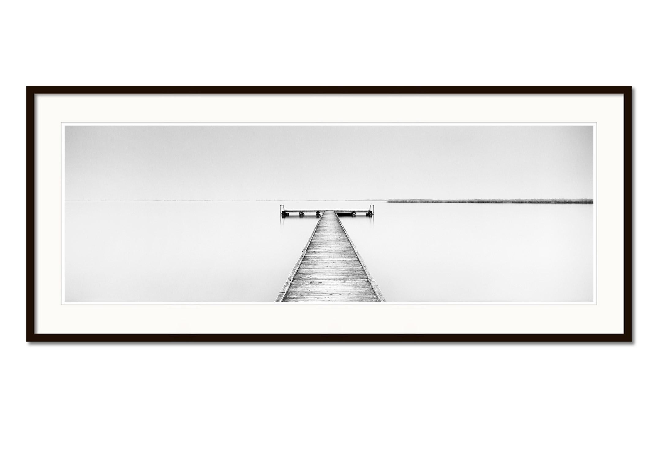 Wood Pier Panorama, minimalist black and white waterscape photography art print - Gray Landscape Photograph by Gerald Berghammer