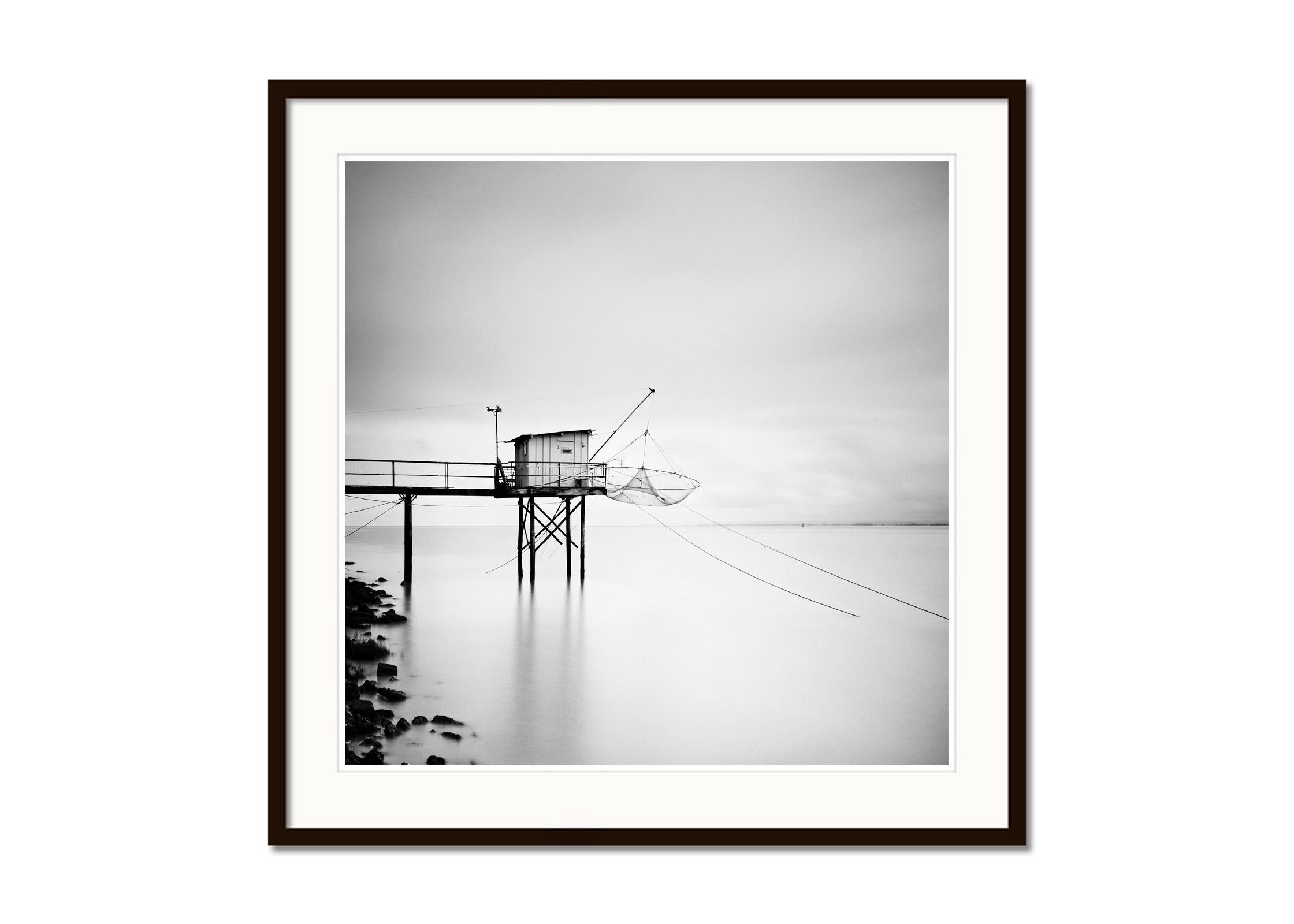 Wooden fishing Hut on Stilts, France, black and white art waterscape photography - Gray Landscape Photograph by Gerald Berghammer