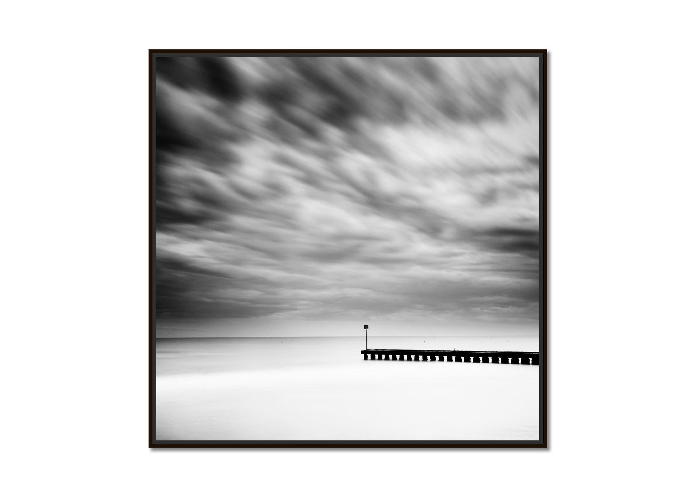Wooden Pier in the Sea, black and white, long exposure photography, landscape - Photograph by Gerald Berghammer