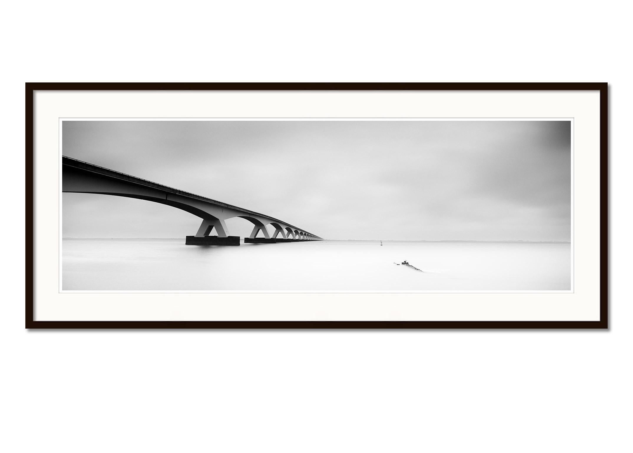 Zeeland Bridge Panorama, Netherlands, black and white waterscape art photography - Gray Landscape Photograph by Gerald Berghammer
