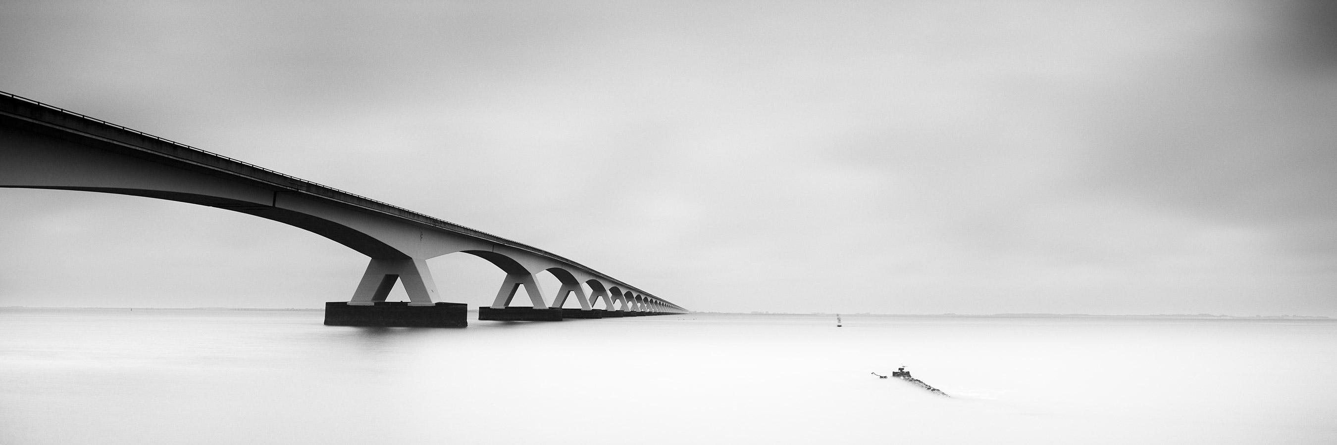 Gerald Berghammer Landscape Photograph - Zeeland Bridge Panorama, Netherlands, black and white waterscape art photography
