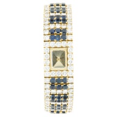 Gerald Genta 18 Karat Yellow Gold Diamond and Sapphire Link Bracelet Watch