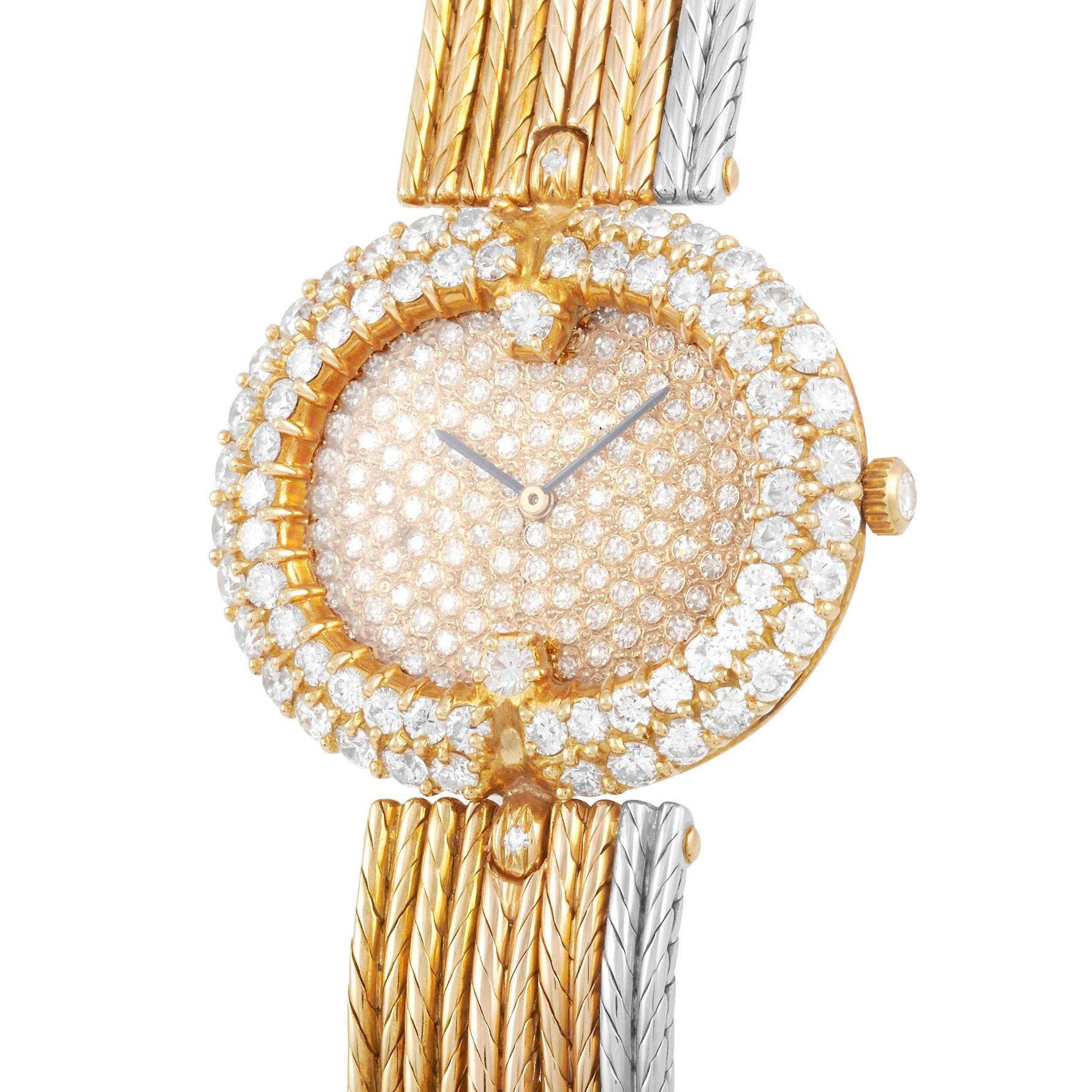 This is a very special watch that was made for the Sultan of Oman by Gerald Genta and Royama. The unique piece is presented in 18K yellow and white gold, and features a two row diamond bezel. The case is presented on a matching 18K yellow and white