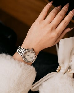 Gerald Genta	Retrograde G3614SS White Mother of Pearl Diamond Jump Hour 1990