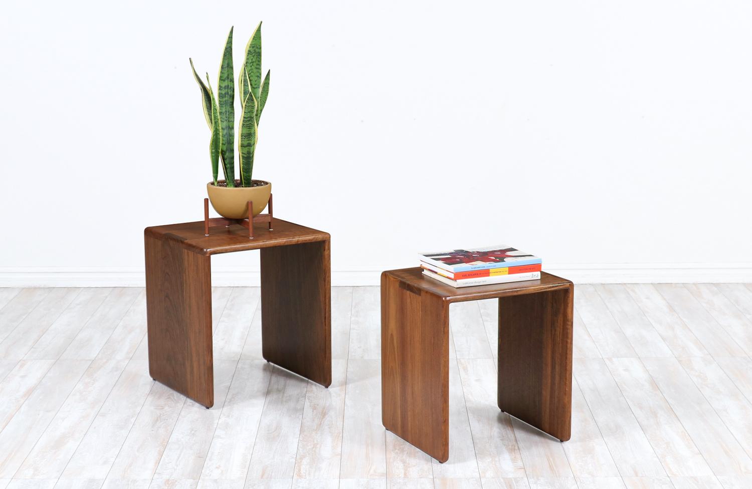 Gerald McCabe cube nesting side tables for orange crate modern

Dimensions:
Large 20in H x 17.75in W x 17.25in D

Small 18.75in H x 16.50in W x 15.50in D.