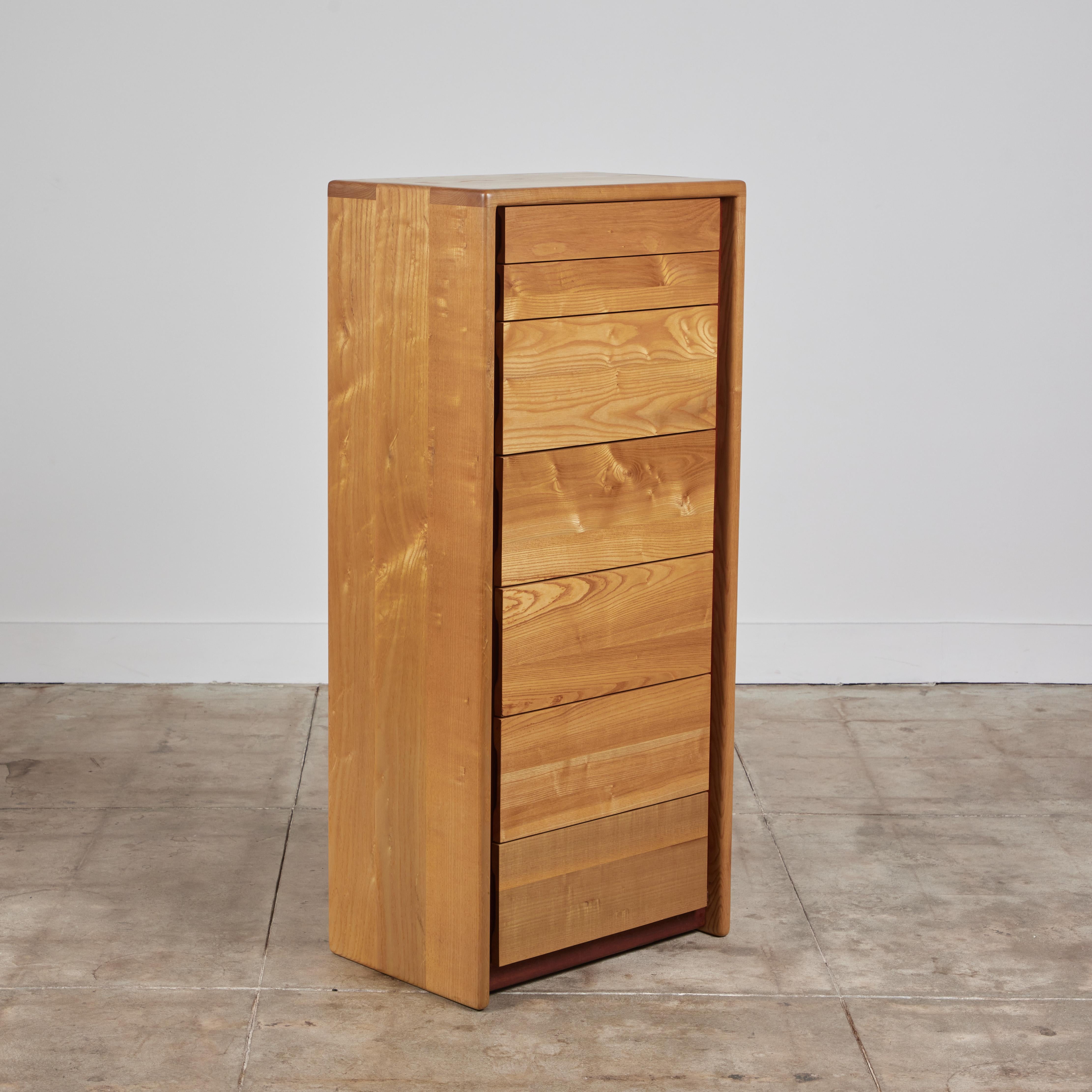 Dresser by Gerald McCabe for Eon Furniture, c.1997, USA. The maple dresser, features soft rounded edges with finger joinery detailing at the edges. The seven flat front drawers feature maple drawer fronts. This piece is stamped - Hand Crafted by