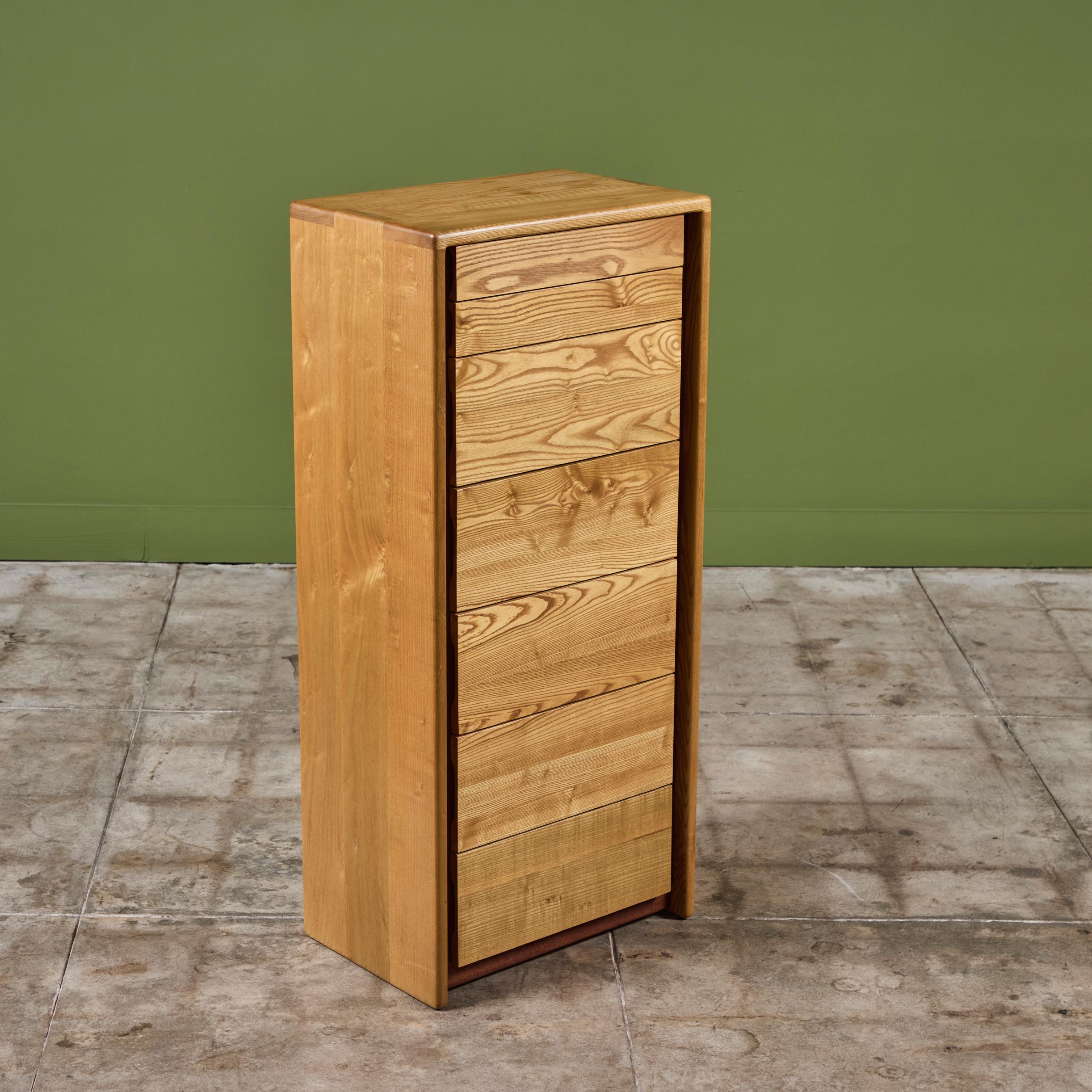 Dresser by Gerald McCabe for Eon Furniture, c.1997, USA. The maple dresser, features soft rounded edges with finger joinery detailing at the edges. The seven flat front drawers feature maple drawer fronts. This piece is stamped - Hand Crafted by