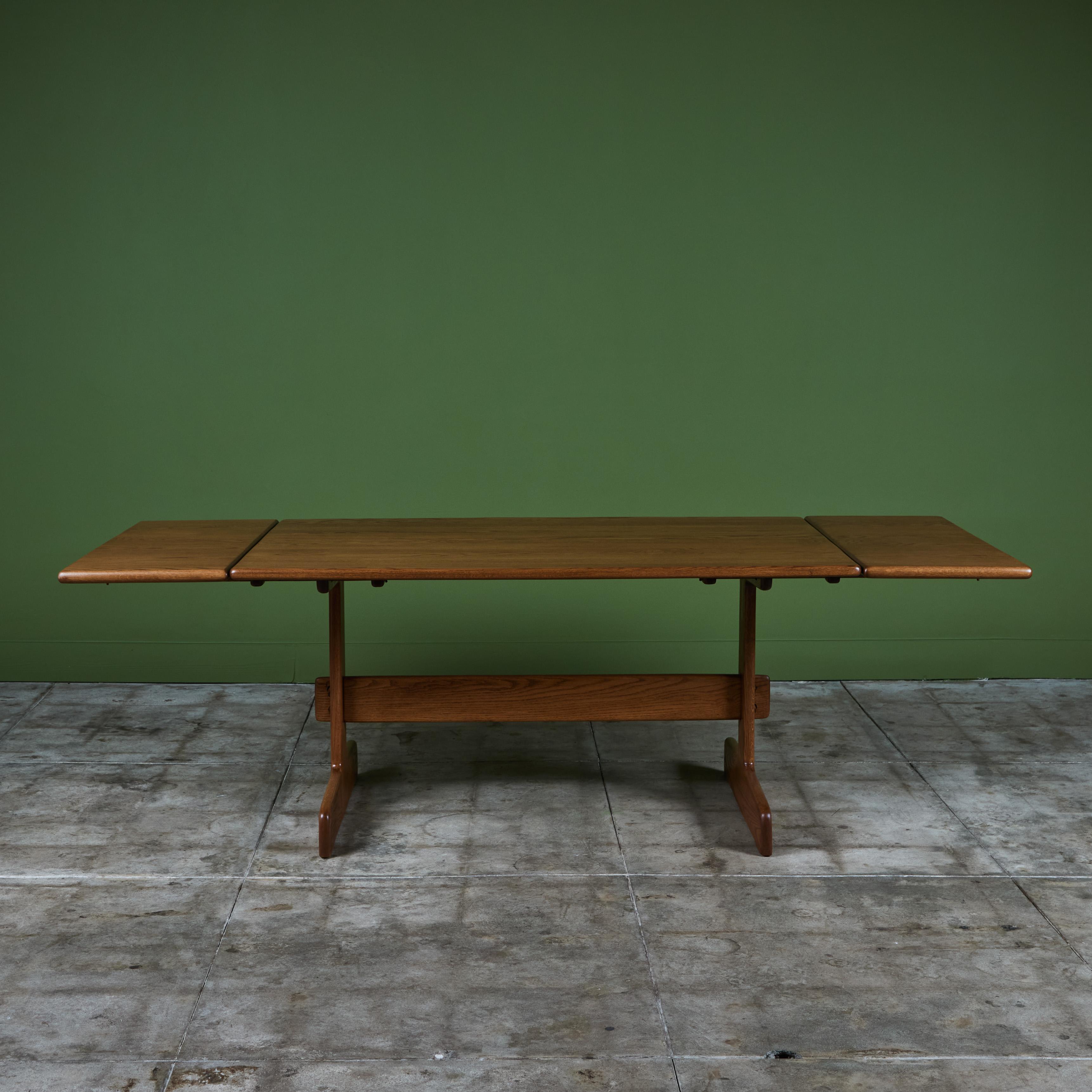 American Gerald McCabe Oak Trestle Dining Table For Sale