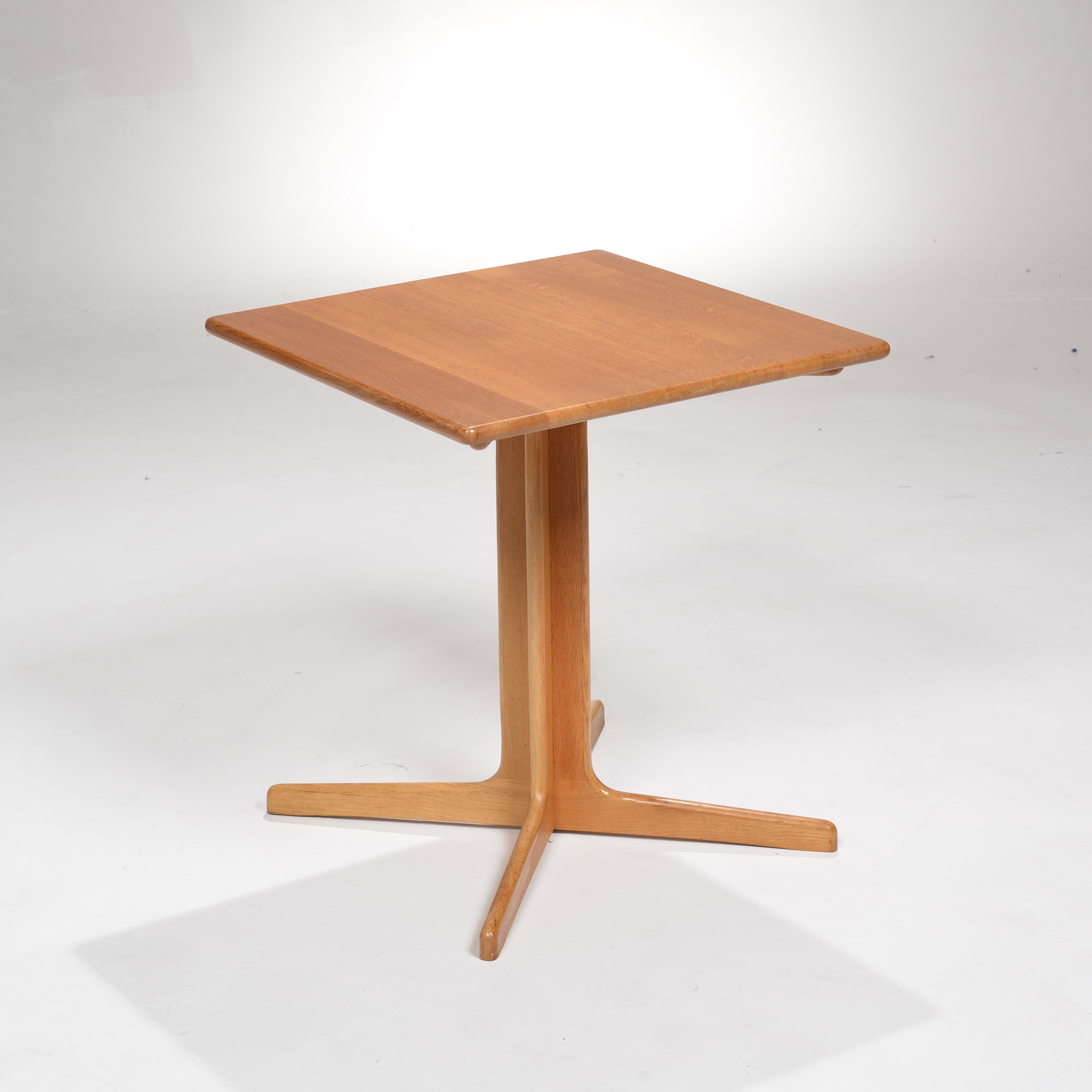 This is a beautiful tall side table by Gerald McCabe for Orange Crate Modern. This table retains its original finish over solid oak.