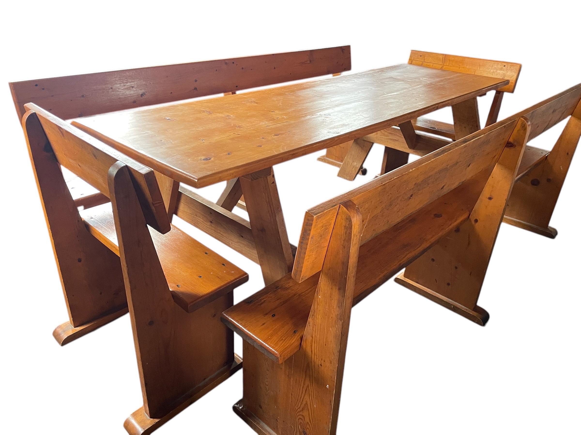 Absolutely incredible vintage family style dining set that’s been used for generations of families gathering together!! Rare set that looks to be Gerald McCabe to us.

We have never seen a set like this, with an expansive table and 4 solid wood