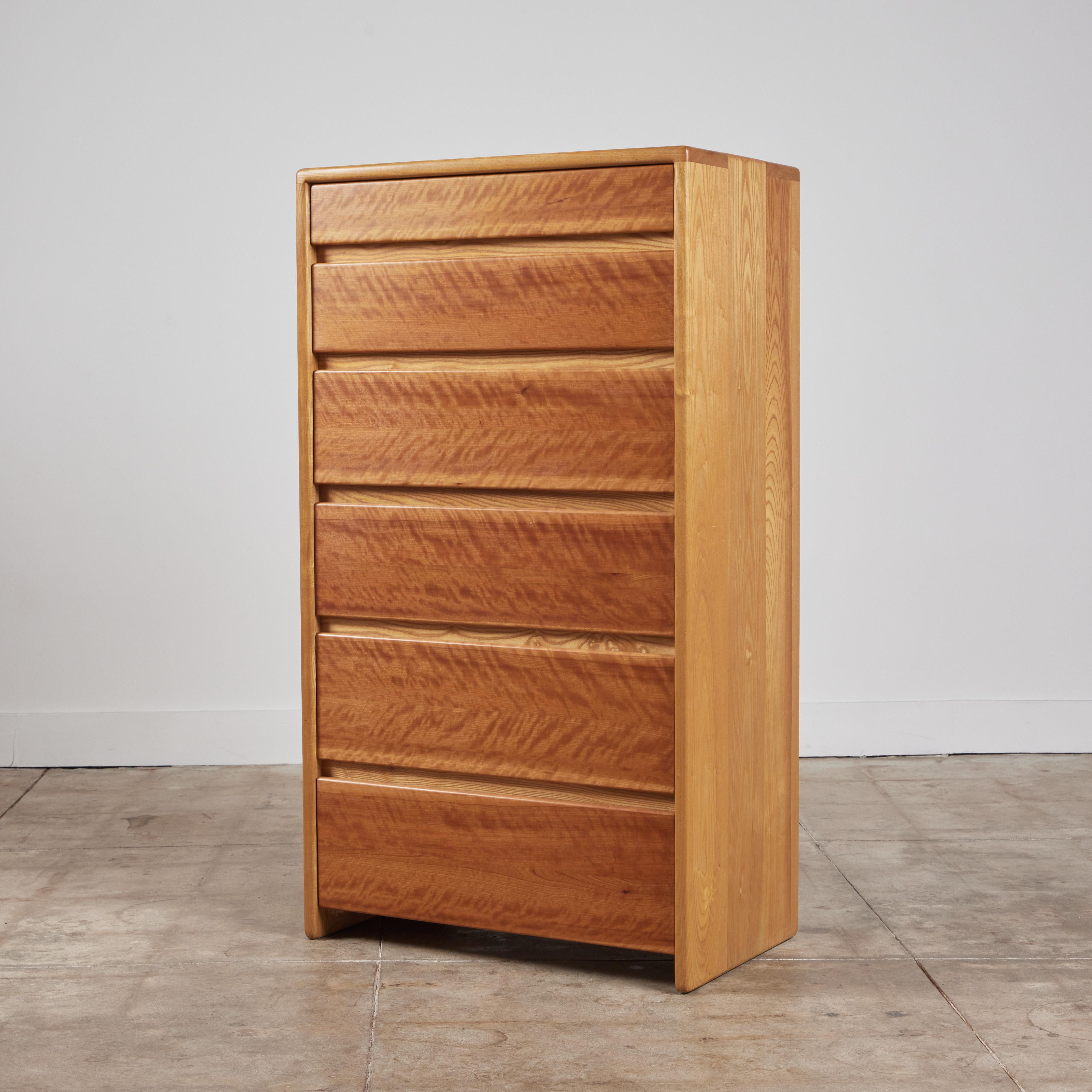 Tall dresser by Gerald McCabe for Eon Furniture, c.1997, USA. The maple dresser, features soft rounded edges with finger joinery detailing at the edges. The six flat front drawers feature maple drawer fronts. This piece is personally signed by Jerry
