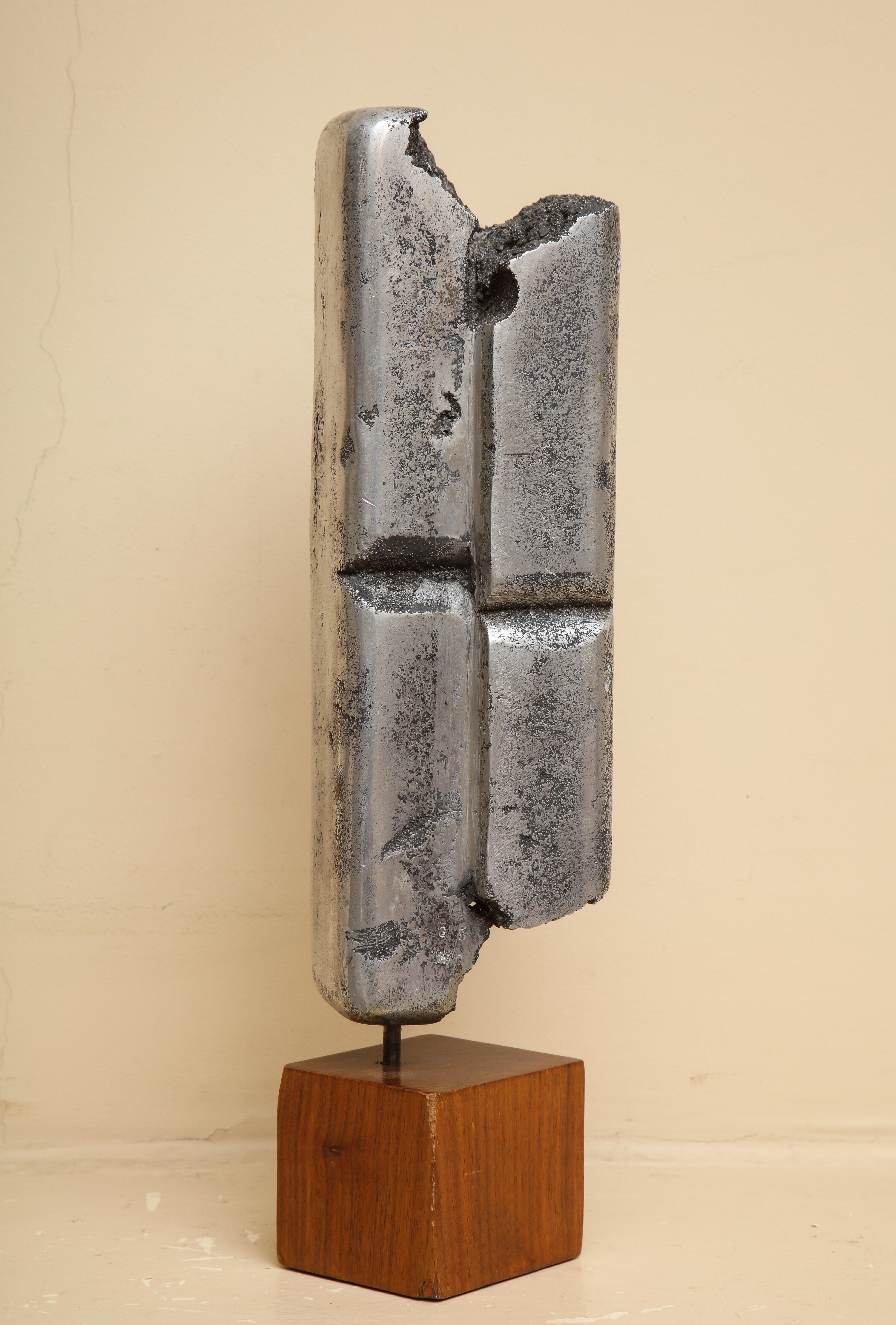 Sculpture 1 of 1. 
Cast Aluminum on wood

Siciliano celebrates in the act of creation with workmanship that is evident in every aspect of his sculpture and three-dimensional design inventions.  In this sculpture from the early 70's, depicts an