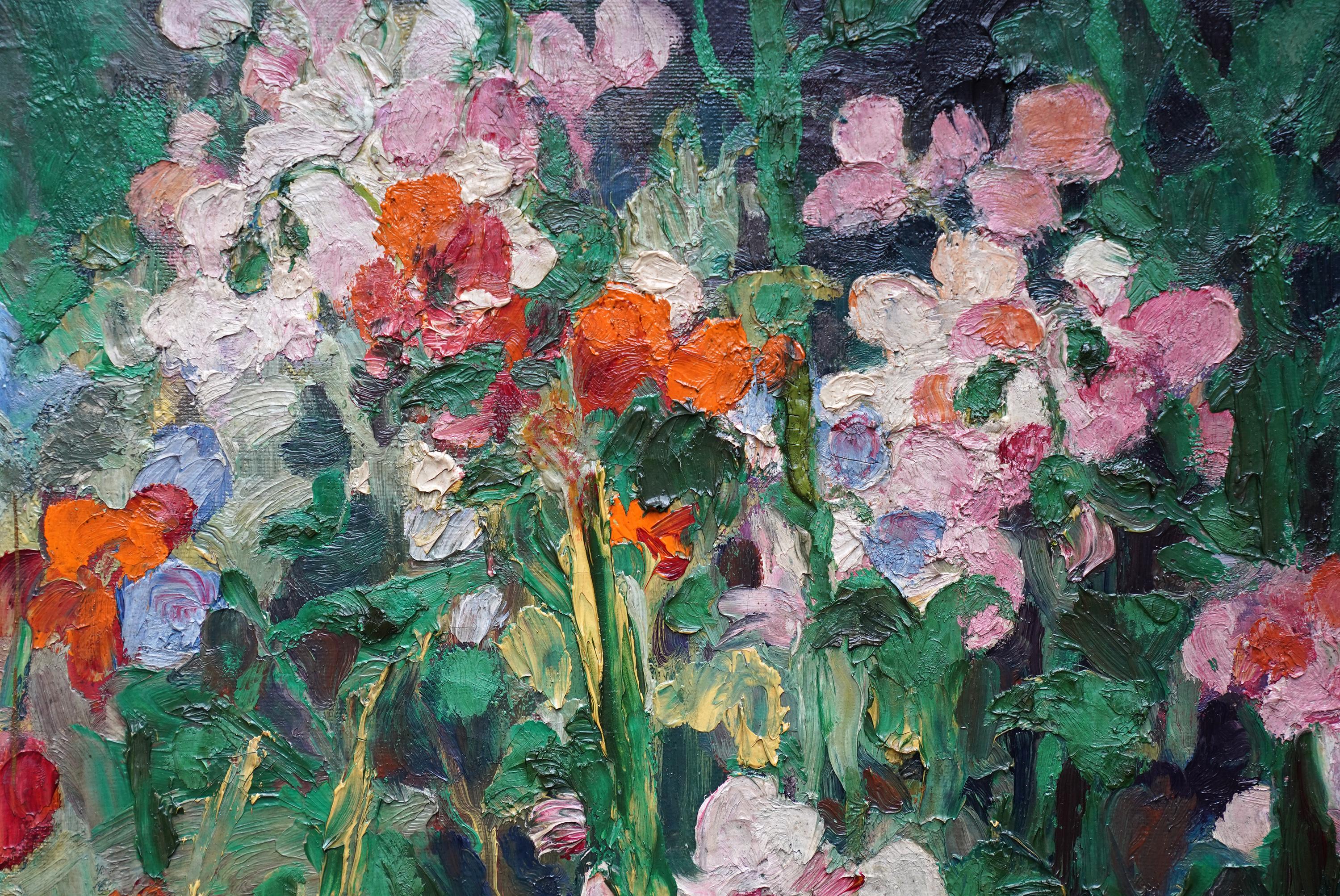 Cette superbe peinture à l'huile florale post-impressionniste britannique est l'œuvre de l'artiste renommé Gerald Spencer Pryse. Peinte vers 1930, la composition est une masse de fleurs de pois de senteur dans des tons roses, remplissant