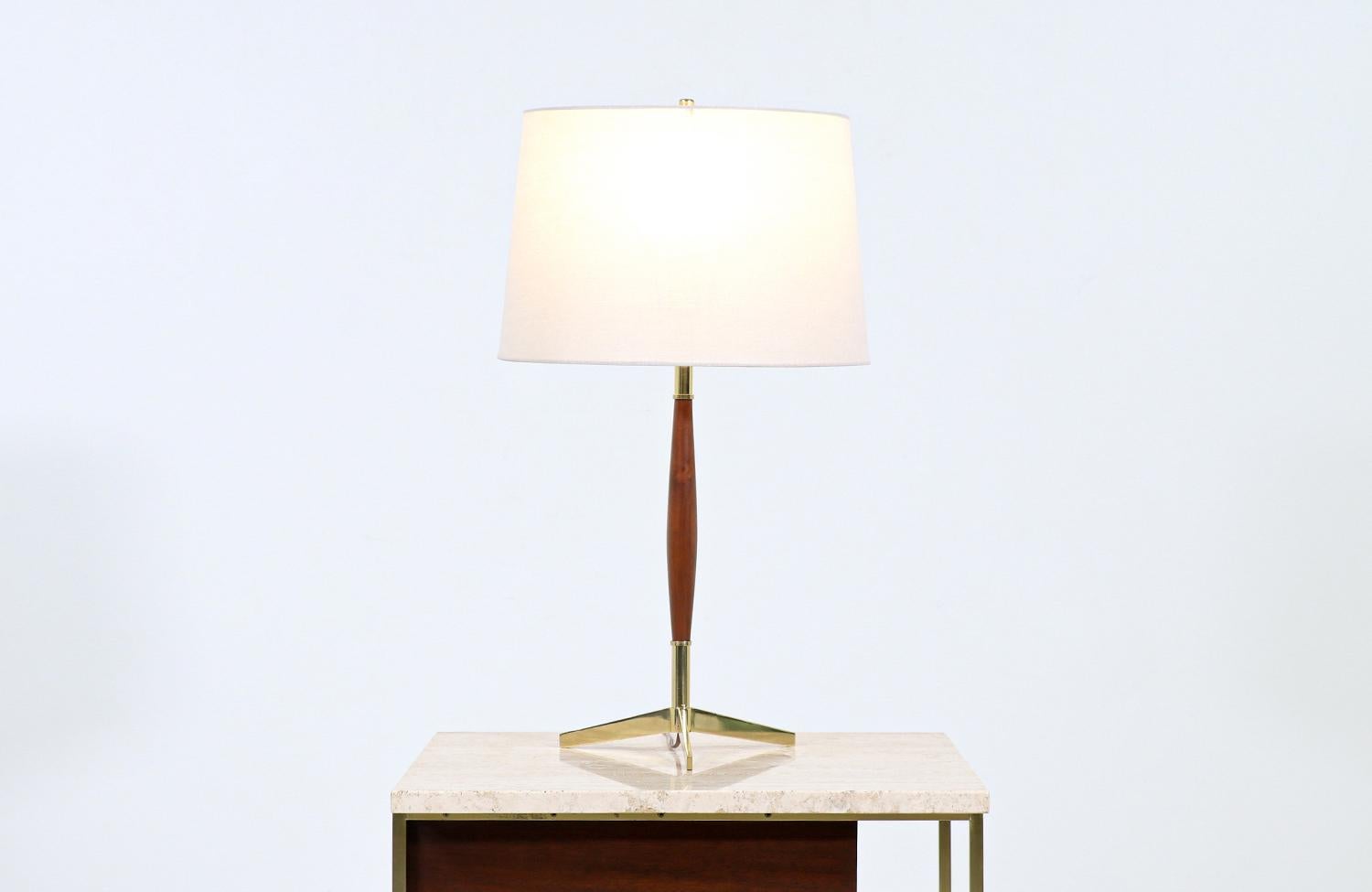Dimensions:

26in H x 10in W x 10in D
Lamp shade: 10in H x 15in W.

________________________________________

Transforming a piece of Mid-Century Modern furniture is like bringing history back to life, and we take this journey with passion and