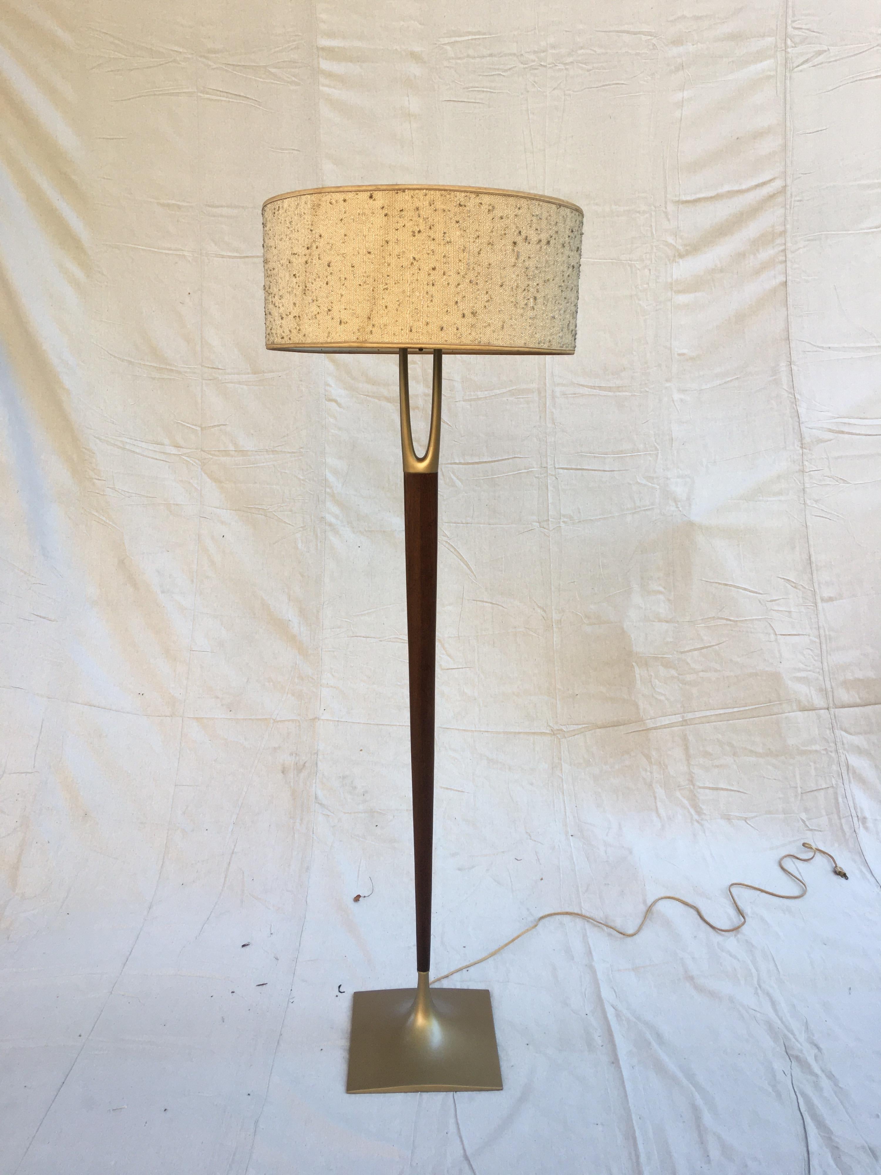 Classic 1950's  Wishbone floor lamp for Laurel Lighting Company. Original shade, does show a little staining as seen in photo. Base and wishbone has been resprayed in a brass tone finish. All looks very clean, but original I believe is a little