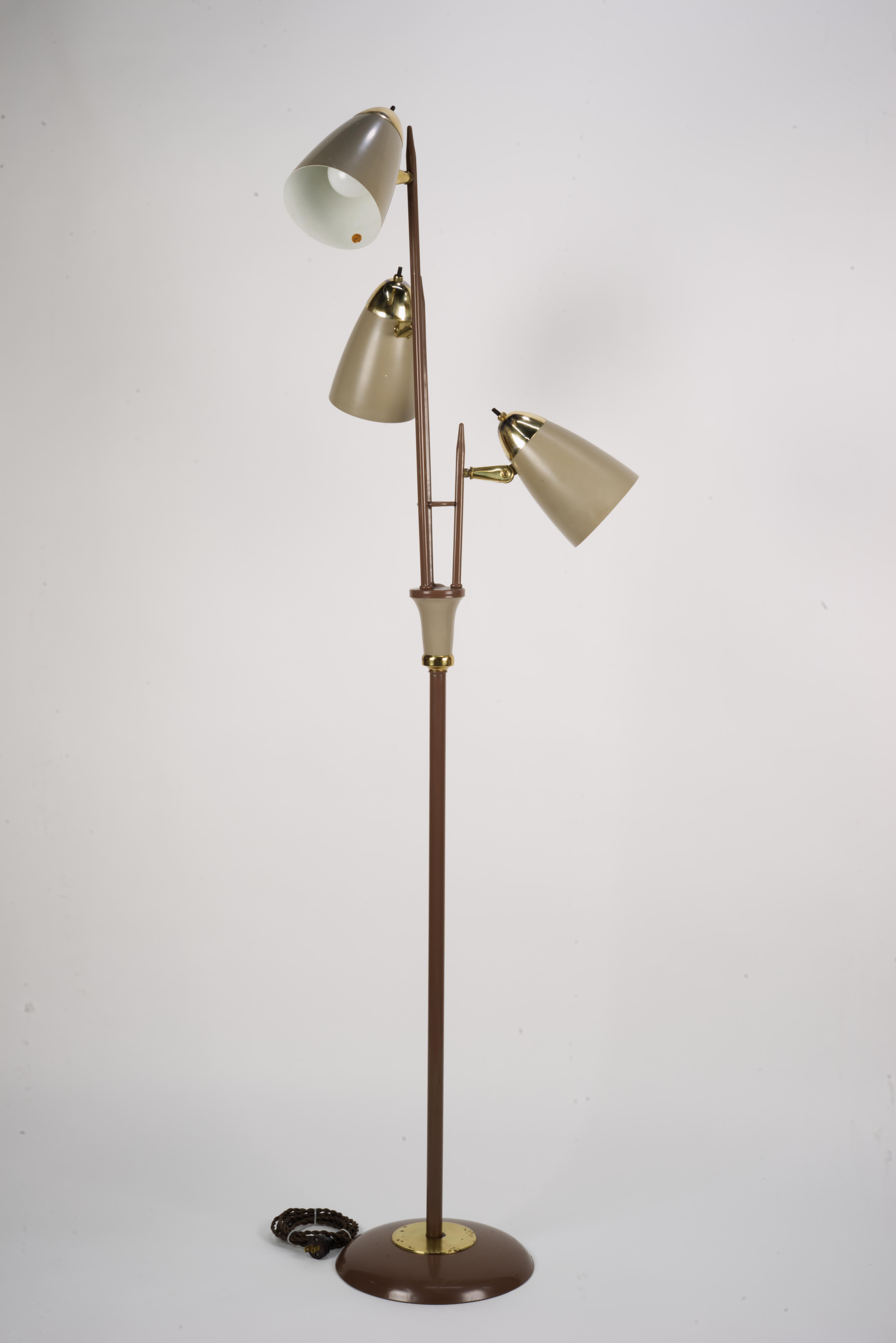 Gerald Thurston Triennale Floor Lamp. This is a well known iconic design. 
Lamp, undergone a good deal of cleaning. 
Sockets were replaced with premium UL listed units. All lights work and the heads are adjustable. 
There are a few scratches on the