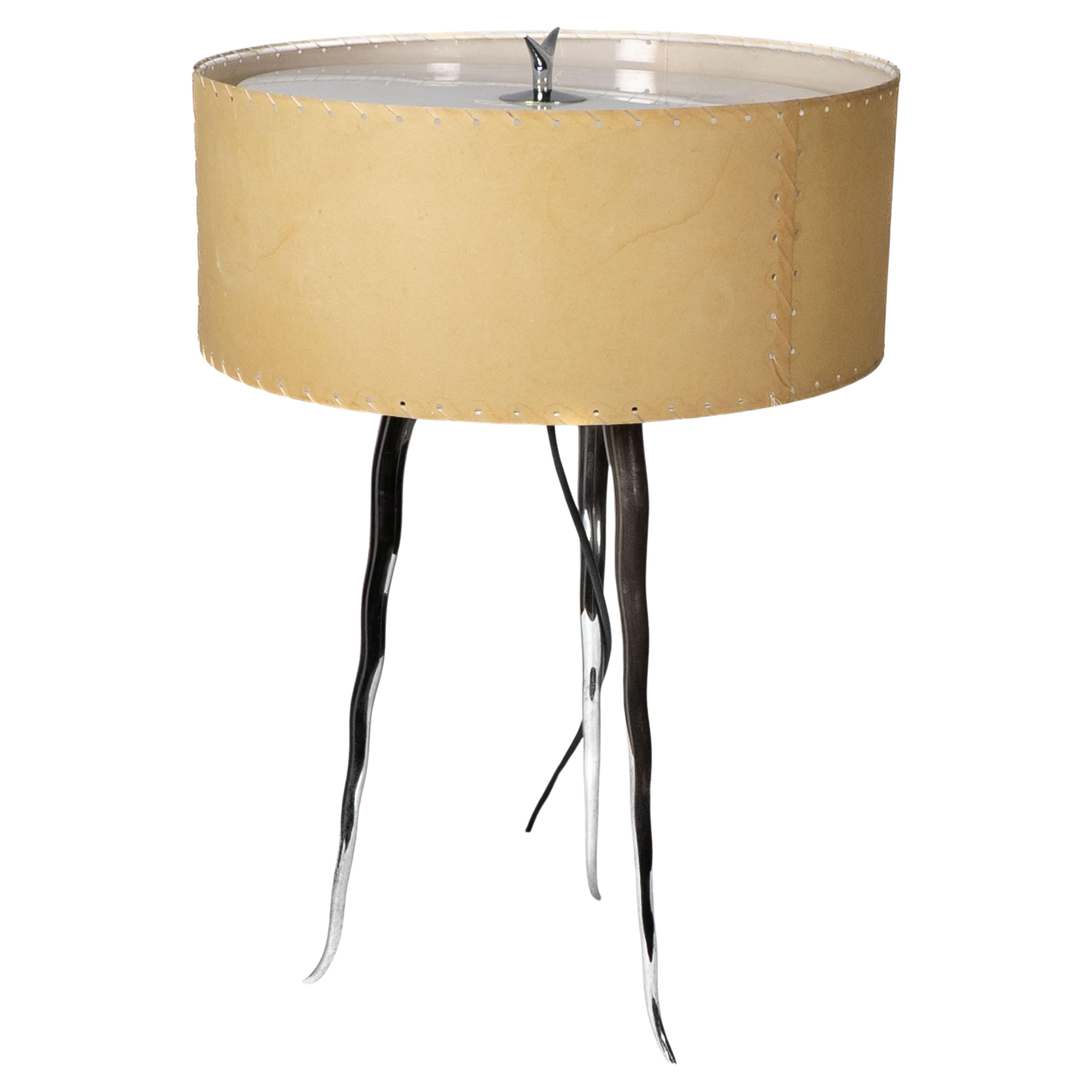 Gerald Thurston dans le style de. Lampe de table tripode en acier poli du milieu du siècle dernier en vente