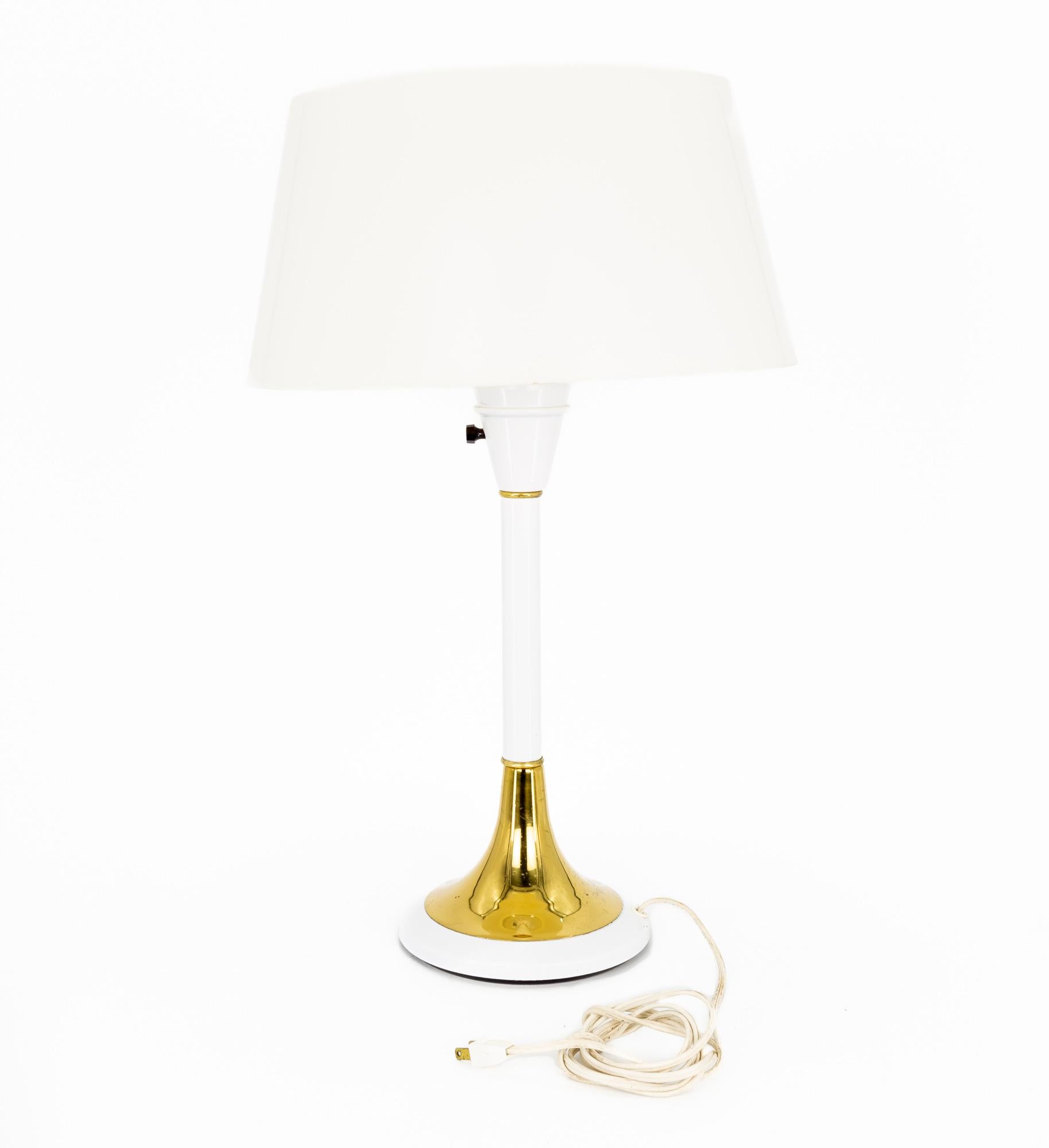 Gerald Thurston Mid Century White Aluminum and Brass Table Lamp 

Original Plastic Shade and Dimmer

This piece measures: 11 wide x 11 deep x 22 inches high and weighs 3.6 pounds

Excellent vintage condition

We take our photos in a controlled