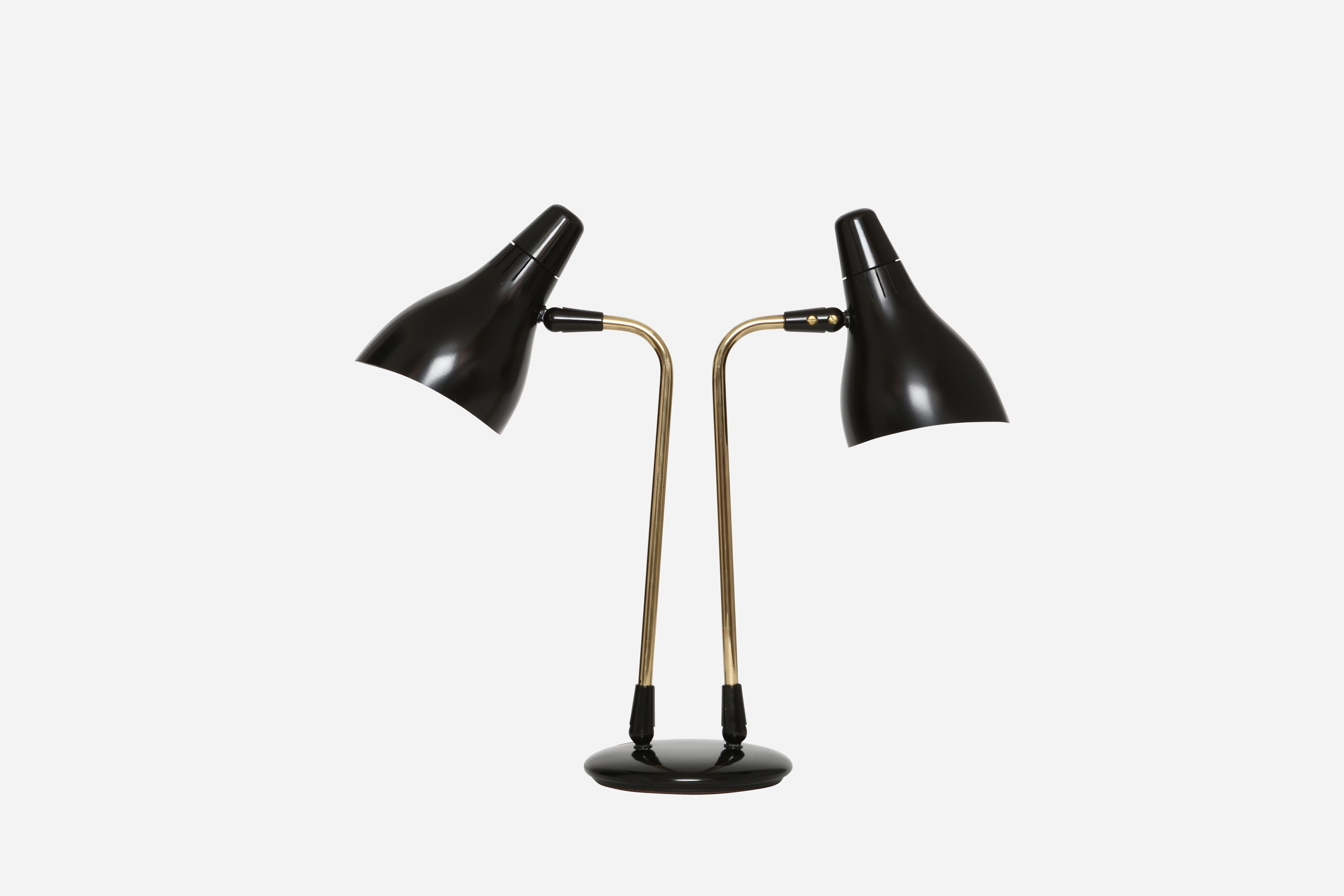 Gerald Thurston desk lamp for Lightolier.
Made in USA in 1950s.
Plastic and brass.