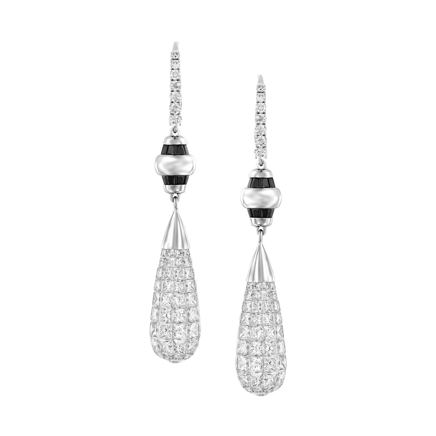 Elevate your style to new heights with the Geraldo 23.15 Carat Briolettes Diamond Invisible Setting Earrings, a true masterpiece of jewelry design. These earrings are a stunning showcase of diamond craftsmanship, with invisible-set princess diamonds