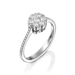 Klassischer floraler Ring aus Weißgold mit Diamanten in unsichtbarer Fassung von Geraldo