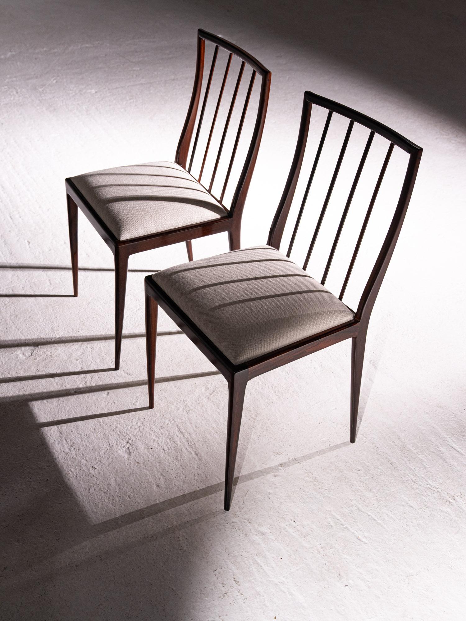 Geraldo de Barros 
Pair of Armchairs, c. 1960  
Solid Wood and Fabric  
Dimensions: 42 x 39 x 84.5 cm (H)

This exceptional pair of armchairs, designed by Geraldo de Barros in the 1960s, exemplifies the innovative spirit of mid-century Brazilian