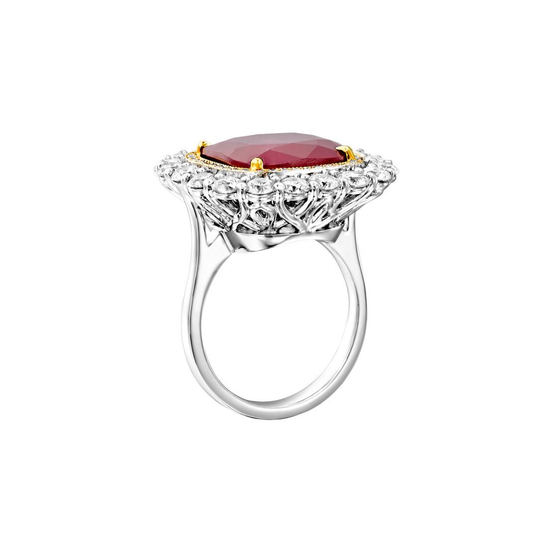 Introducing the exquisite Geraldo Ruby Diamond Ring, a true masterpiece that exudes timeless beauty and unparalleled craftsmanship. This remarkable ring showcases an extraordinary combination of elegance and glamour, featuring a stunning array of