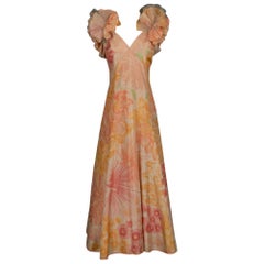 Vestito lungo di Gerard Blaise nei toni dell'arancio e del rosa