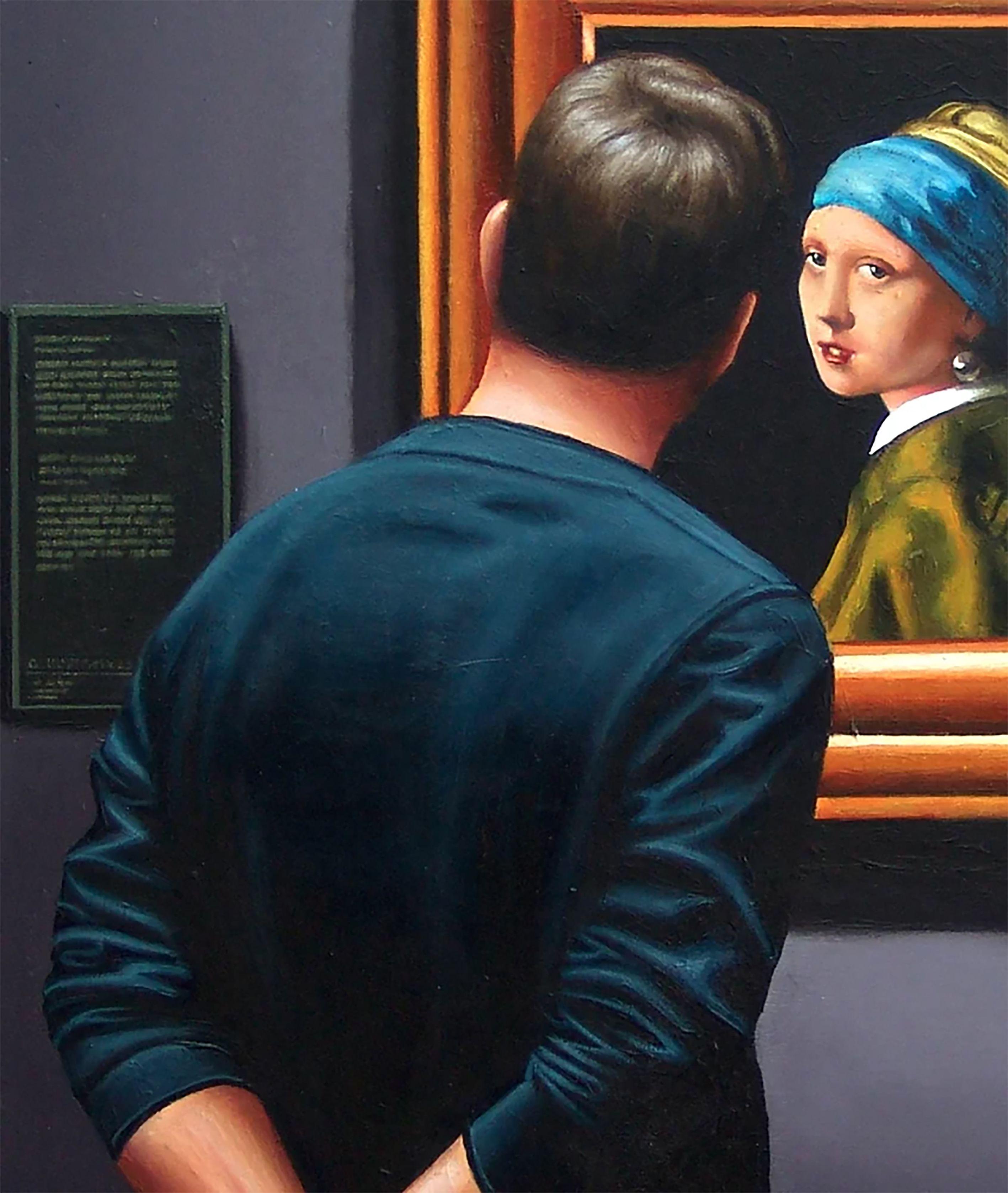 El hombre de mi cuadro está disfrutando del cuadro más famoso de Vermeer La joven con el pendiente de perla. No es un retrato, sino una â€˜tronieâ€™, una pintura de una figura imaginaria. Las tronías representan un determinado tipo o personaje; en
