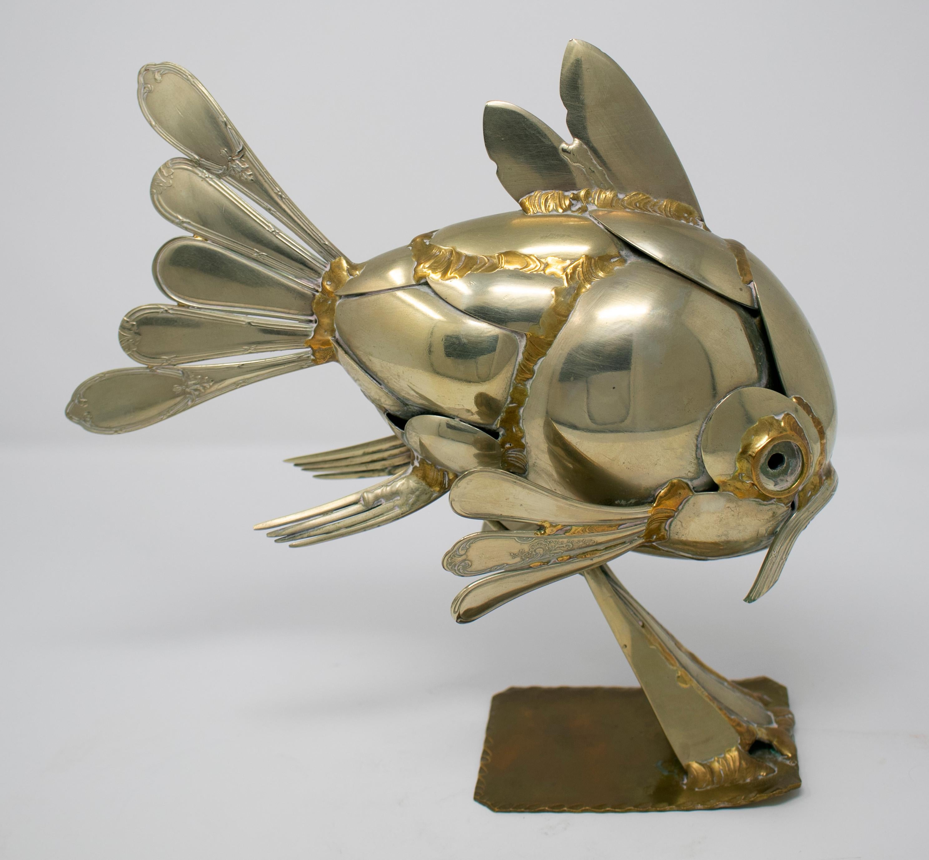 Gerard Bouvier metal cutlery sculpture of a fish, circa 1970.
      