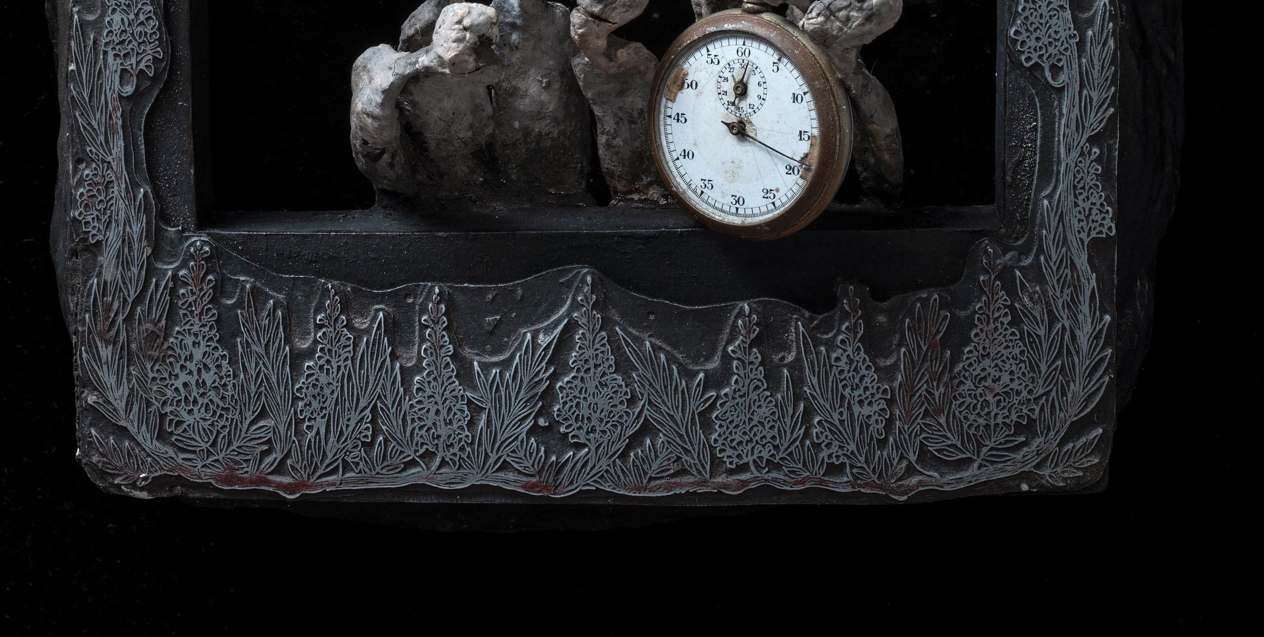 Outsider Art Wall Sculpture: 'It's Time' - Black Figurative Sculpture by Gerard Cambon