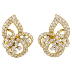 A Gérard Boucles d
oreilles nœud floral en diamant