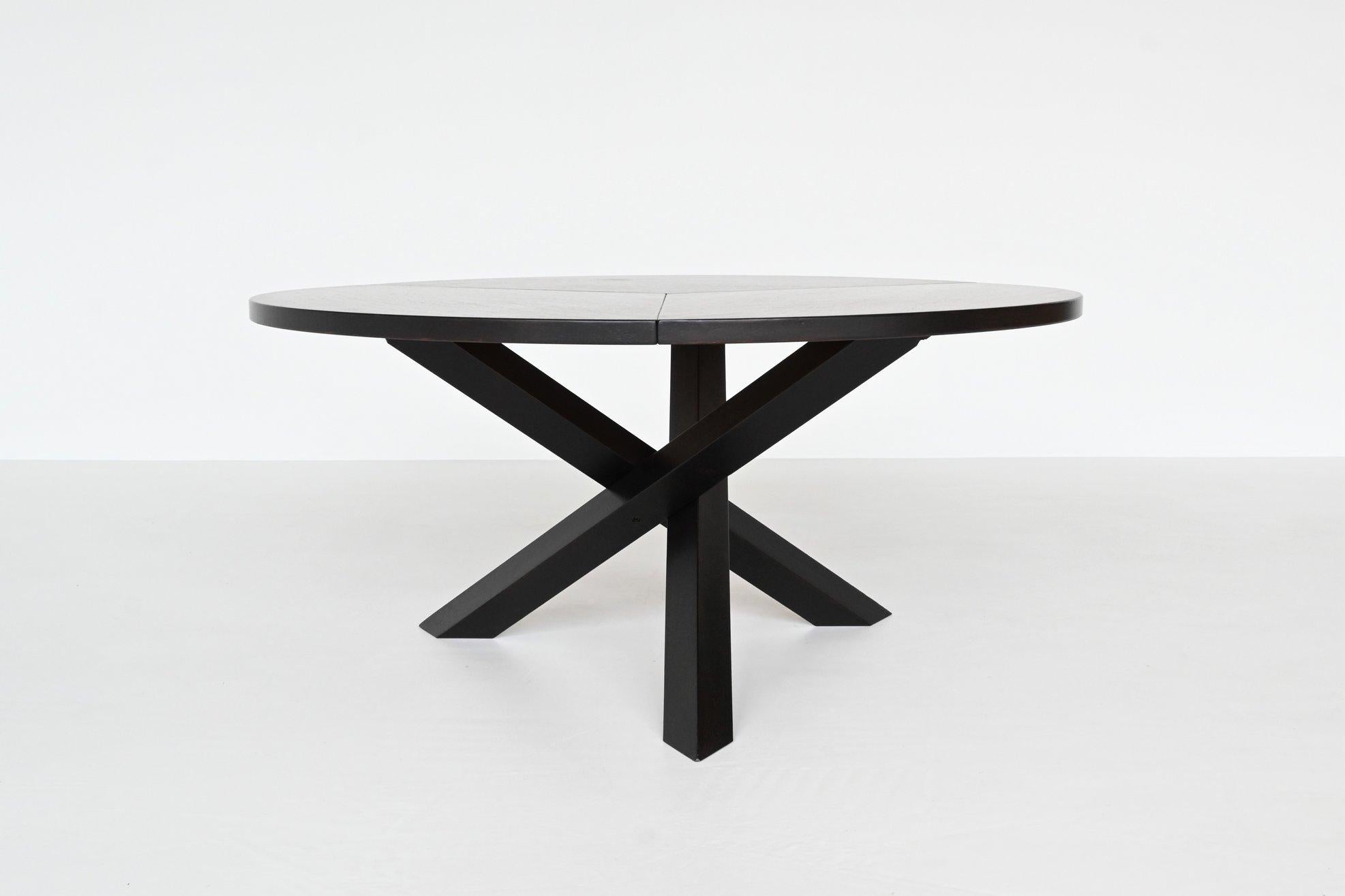 Beautiful sculptural dining table designed by Gerard Geytenbeek and manufactured by AZS Meubelen, The Netherlands 1960. This design is very often attributed to Martin Visser for ‘t Spectrum. The base consist of three crossed legs of solid darkened