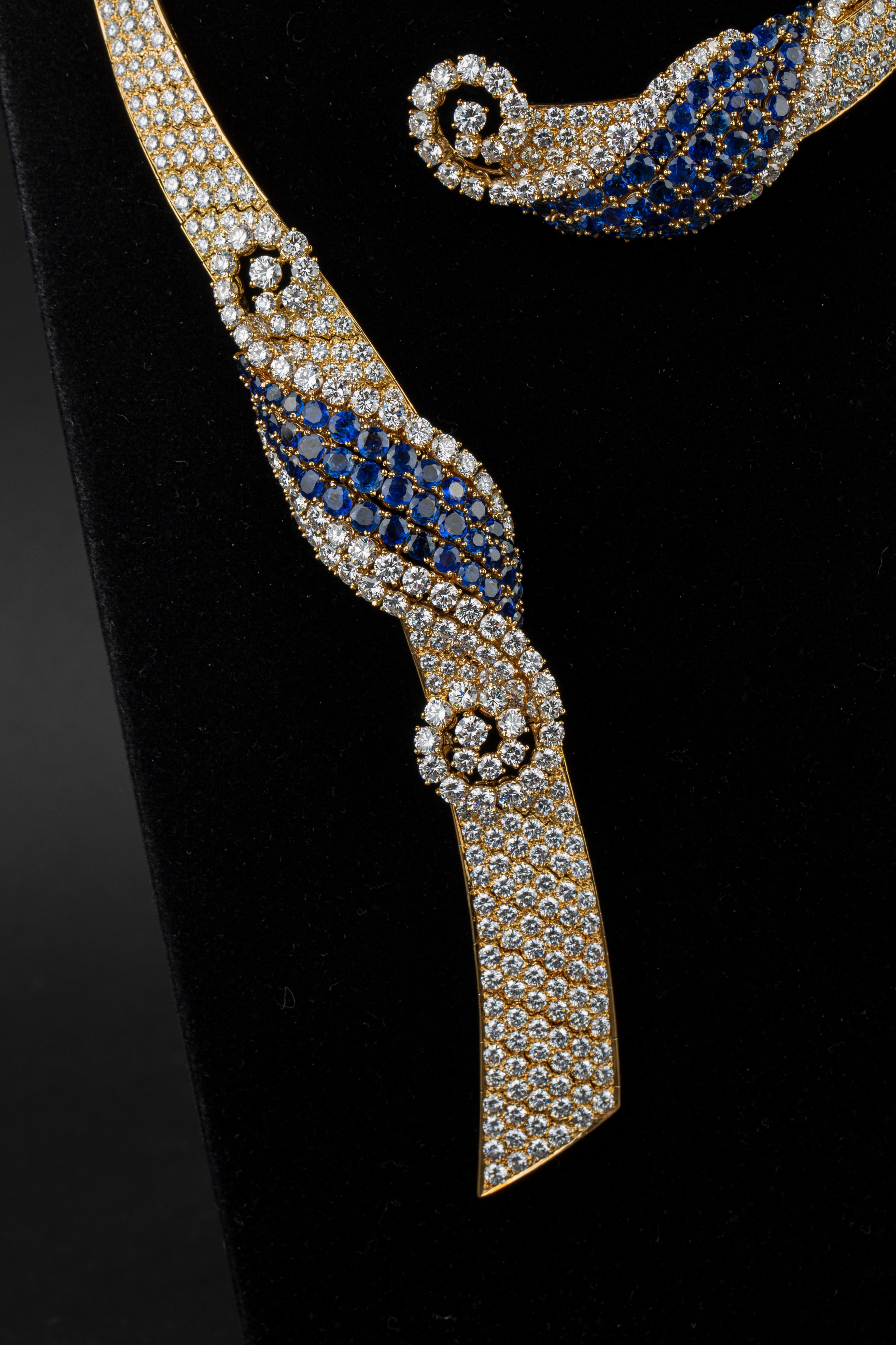 M.Gerard Diamond and Sapphire Necklace, and Earrings Set in 18K Yellow Gold. Made in Paris by esteemed jeweler André Vassort in the 1970s.

matching bracelet available too. 

102 carats of fine quality diamonds, E/F Color - VVS Clarity

35 carats of