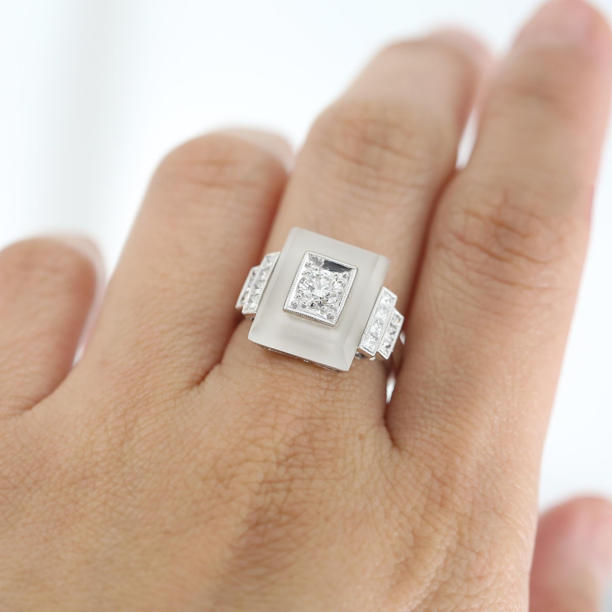 Savoir-faire white quartz and diamond ring. This exceptional ring features a mix of round brilliant cut and princess cut diamonds in this intricate, stepped design. Metal is 18ct white gold. 

Quartz: white crystal = 4.32ct.

Diamonds: Round