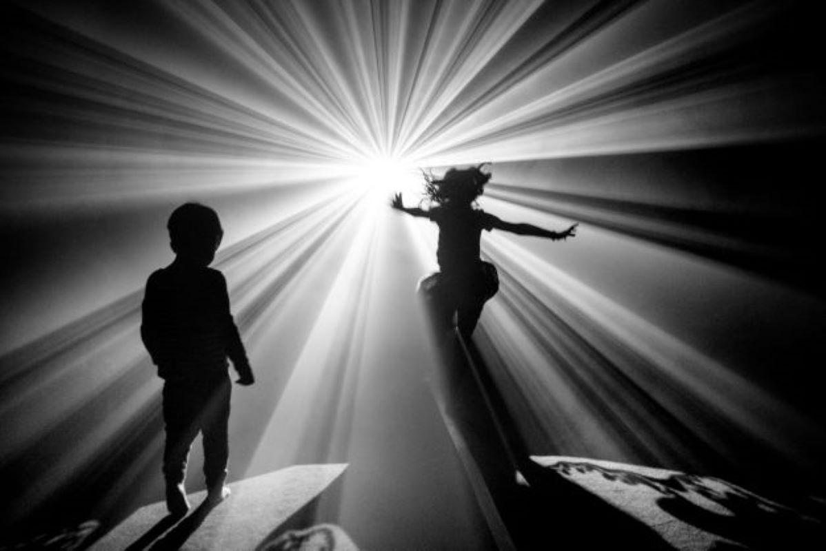 Gérard Uféras Still-Life Photograph - A day in the museum - children playing in the light and jumping